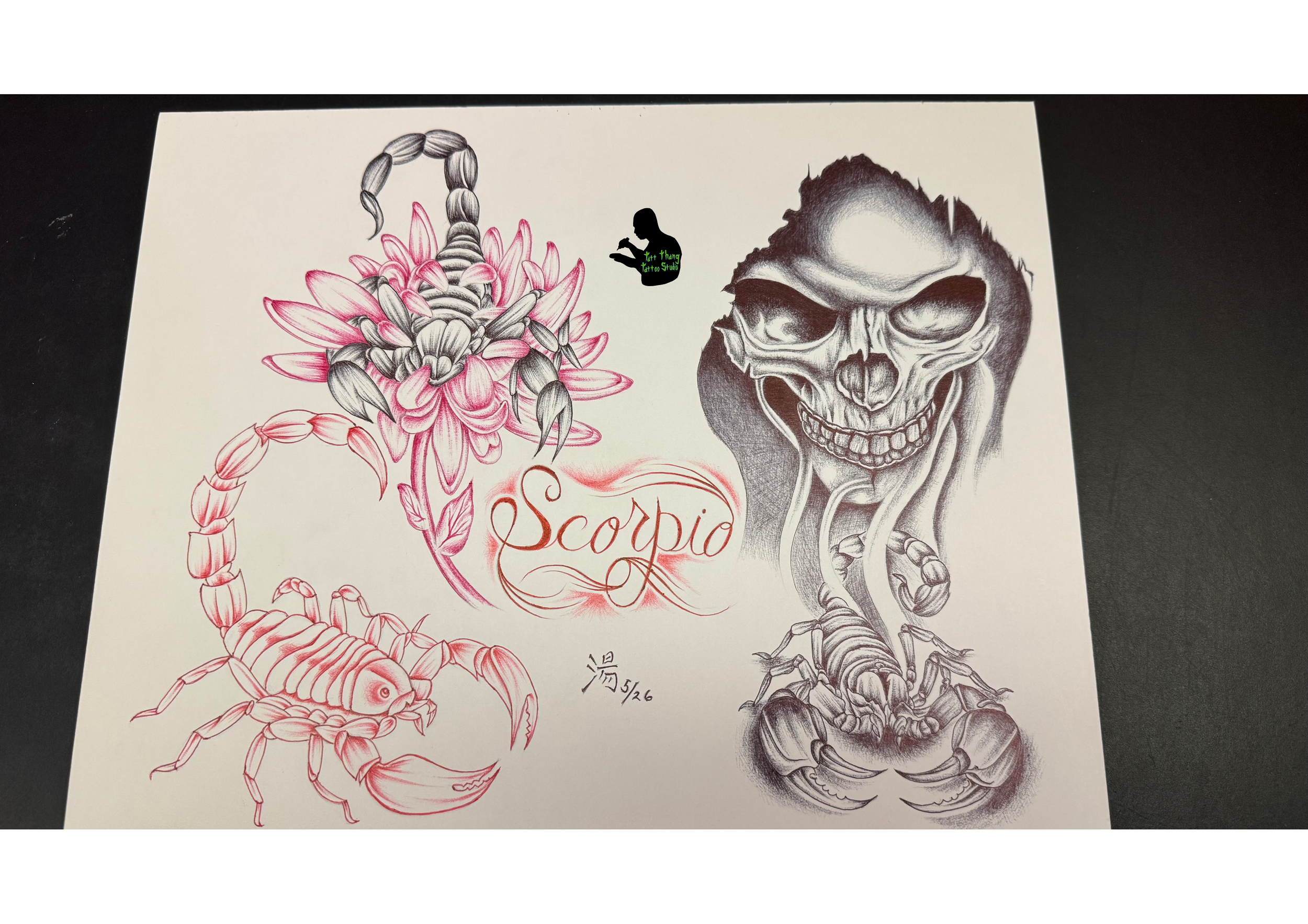 Tattoo design featuring a detailed, realistic skull with a scorpion on the left side drawn in pink and black ink.