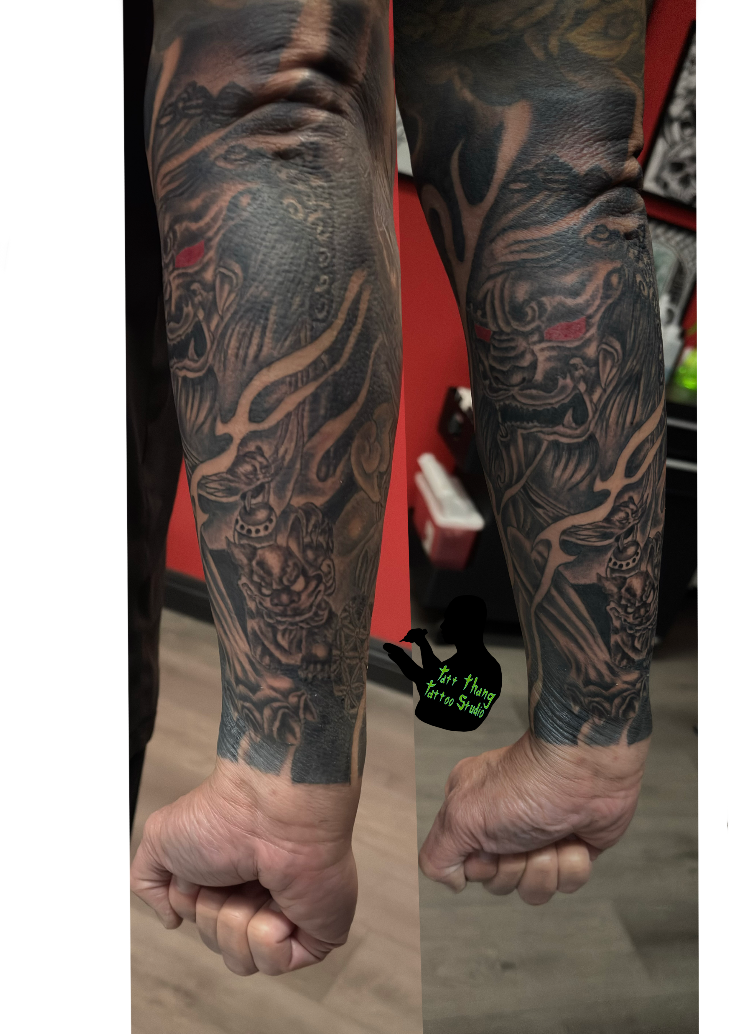 Close-up of a person's arm with detailed black and gray tattoos of a Fu Dog.