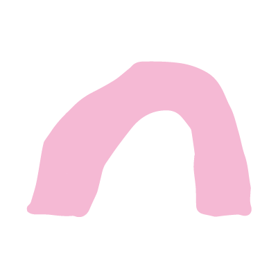 Pink pillow on a black background.