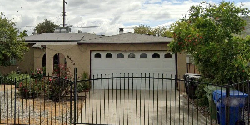 The residential exterior of Carrie’s Board and Care in Panorama City, a senior living home providing residents with access to boutique doctors and personalized care.