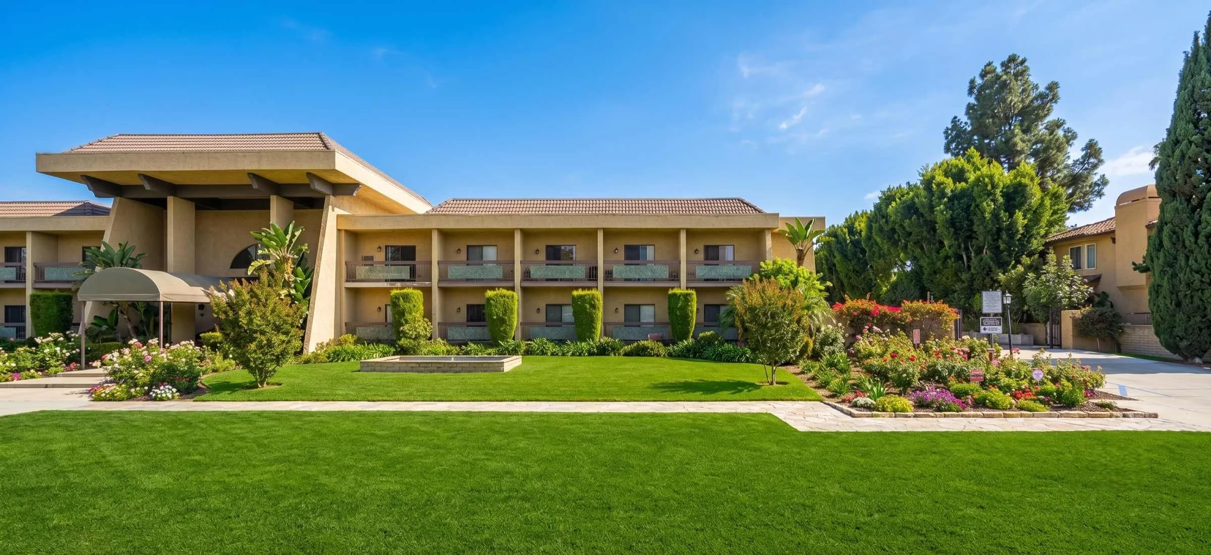 Front exterior of Arcadia Gardens Retirement Hotel, a senior living community in Arcadia, California