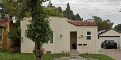 A quiet, residential-style home located at 834 E Glenoaks Blvd, serving as a specialized facility for in home care for seniors in Glendale, California.