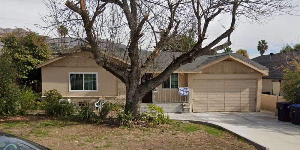 Exterior view of Burbank Villa Inc, a boutique residential care facility for the elderly in Burbank, CA, offering a comfortable home-like environment with professional geriatrics care and access to family physicians.