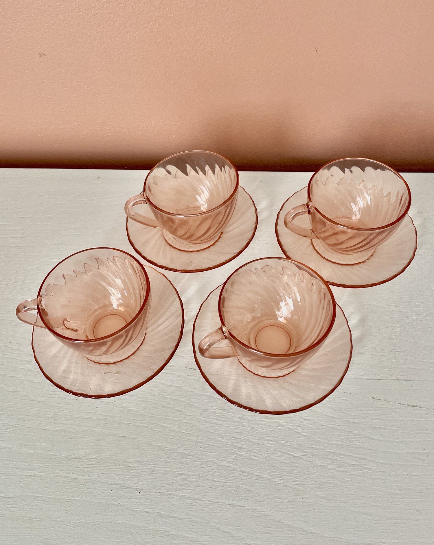 Arcoroc pink glass tea cups and saucers, France.