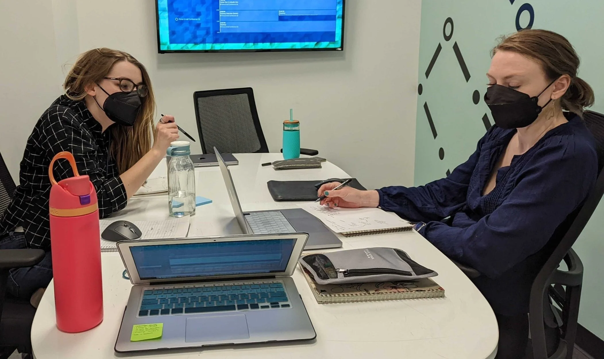 Women working at a conference table