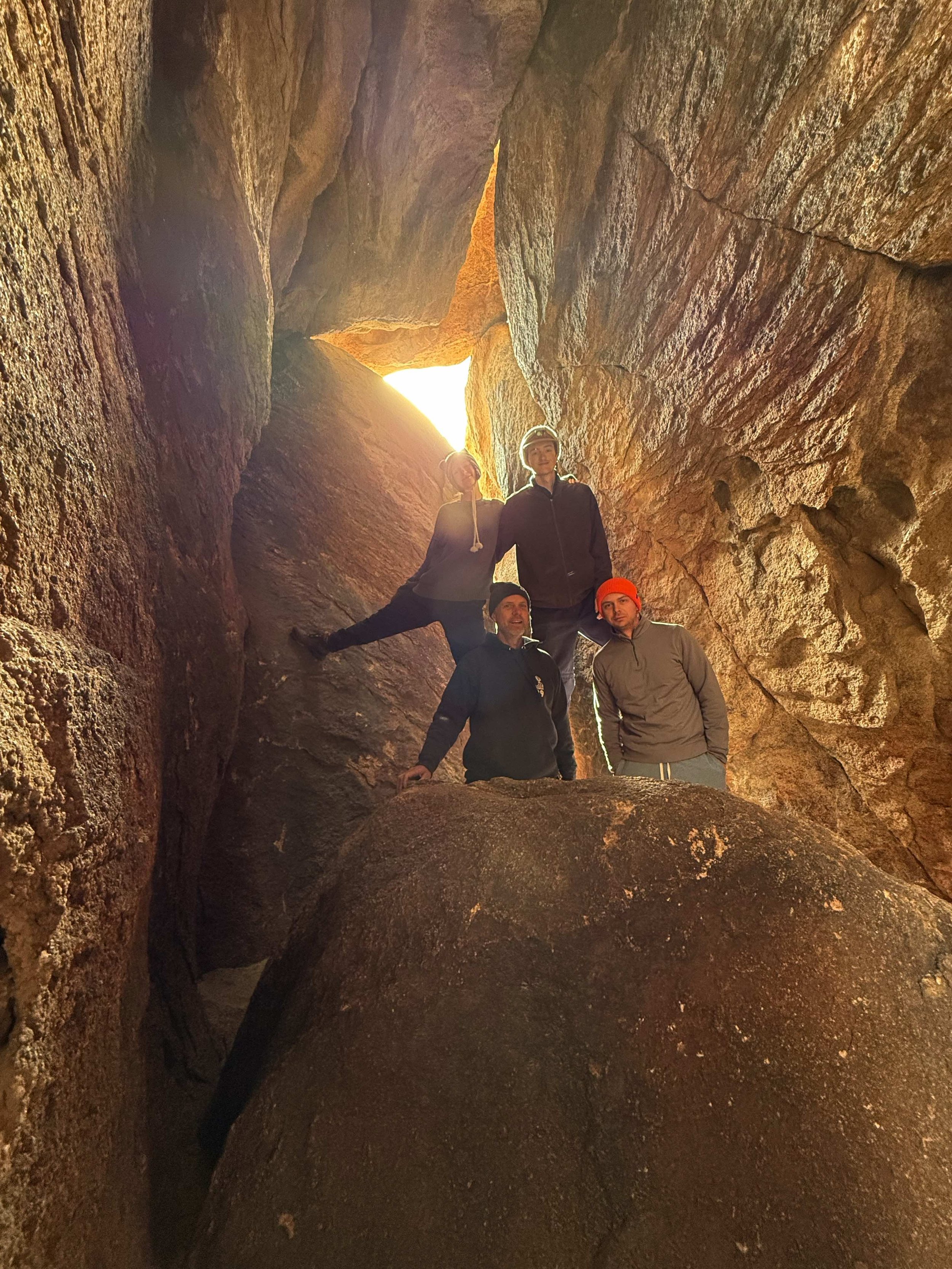 Summit_Climbing_Guides_Joshua_Tree_Guides_Adventure_Routes_Group_Picture_Inside_Cave.jpg