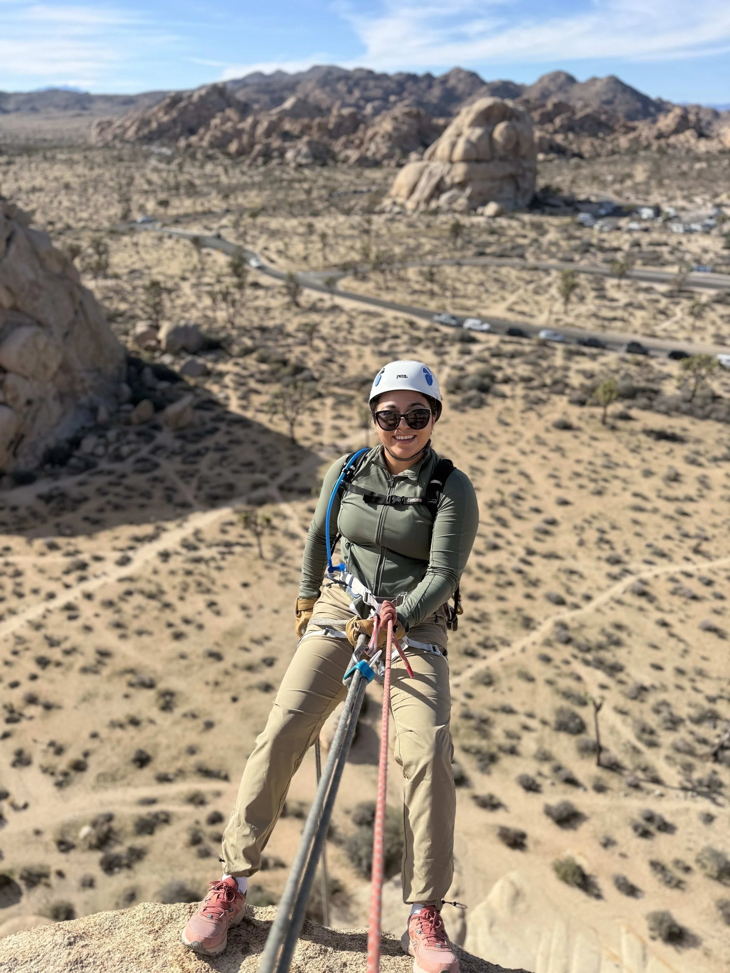 Summit_Climbing_Guides_Joshua_Tree_Guides_Tours_Adventure_Backcountry_Rappelling_Younger_Female_Looking_Forward_Smiling.jpg