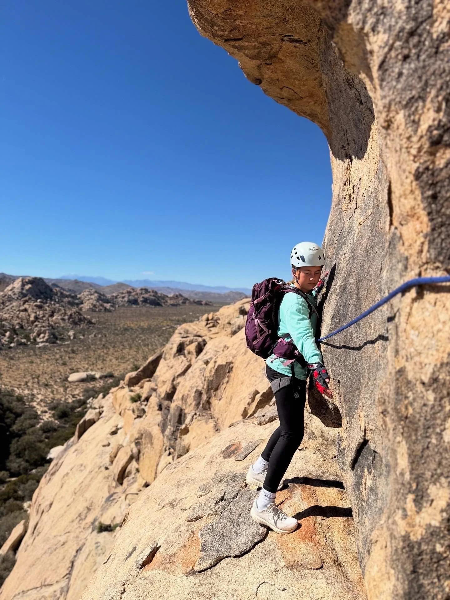 Summit_Climbing_Guides_Joshua_Tree_Guides_Adventure_Routes_Younger_Girl_Traversing_Gloves_On.jpg