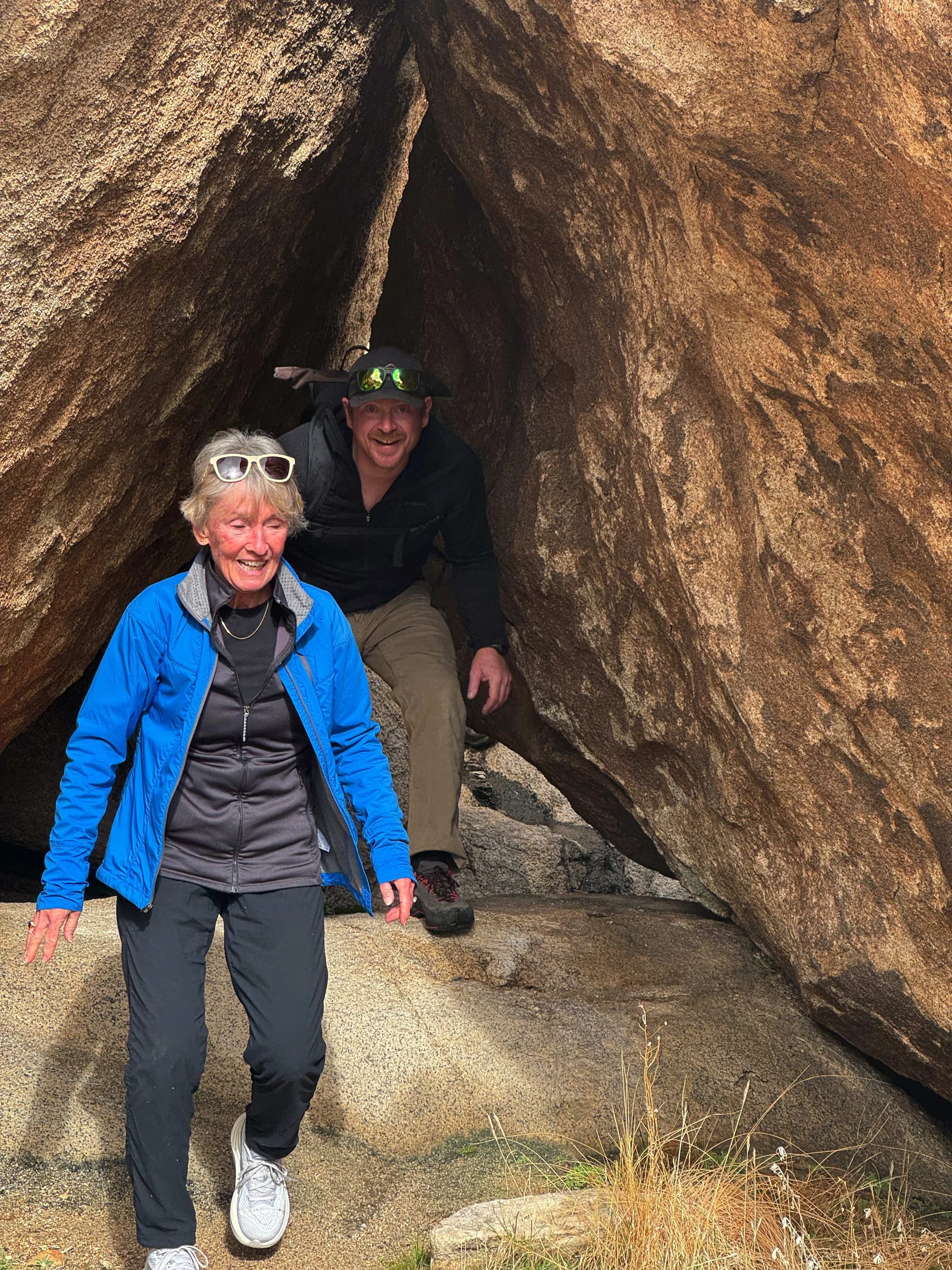 Group exploring the Wonderland of Rocks granite maze in Joshua Tree