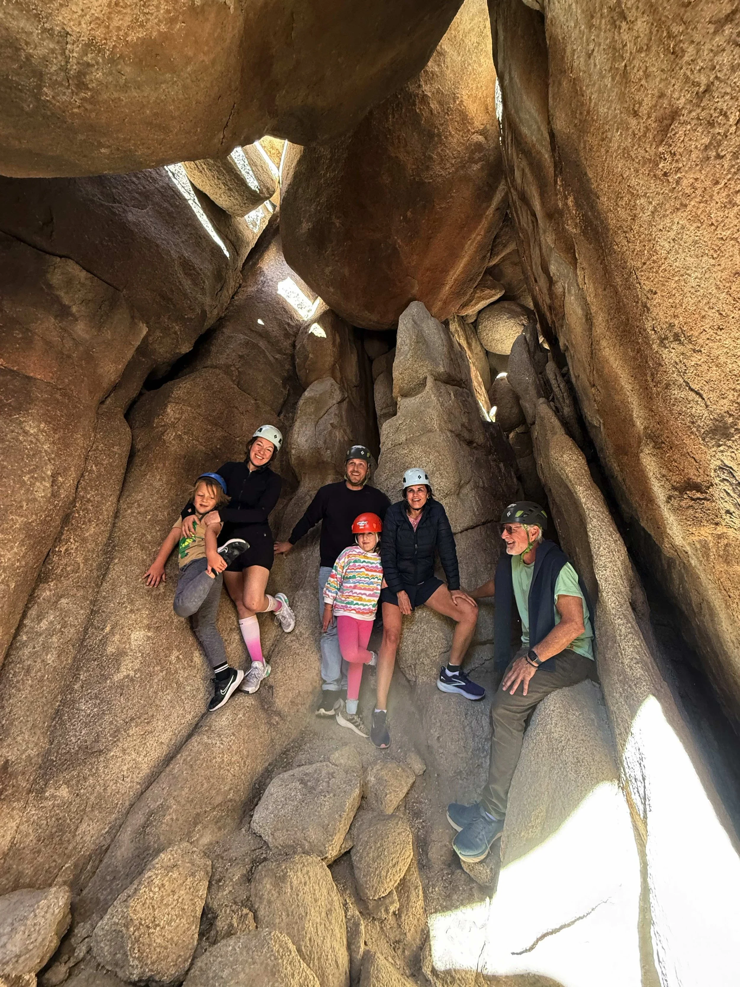 Summit Climbing Guides group in a main cave hall in Joshua Tree