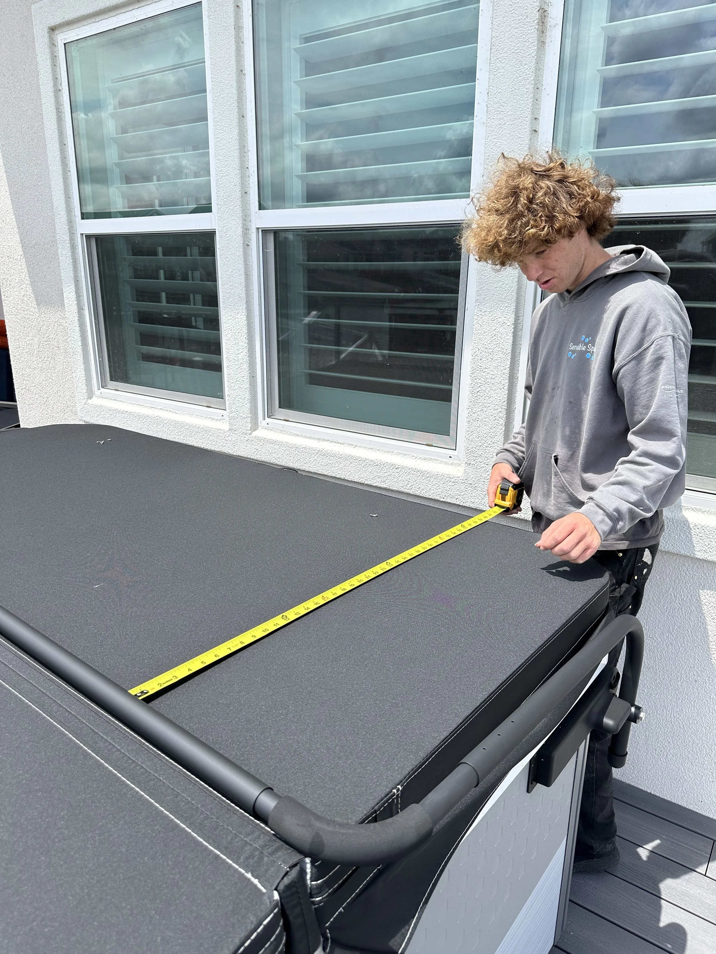 Service tech Jacob setting a cover lifter up
San Jose, CA