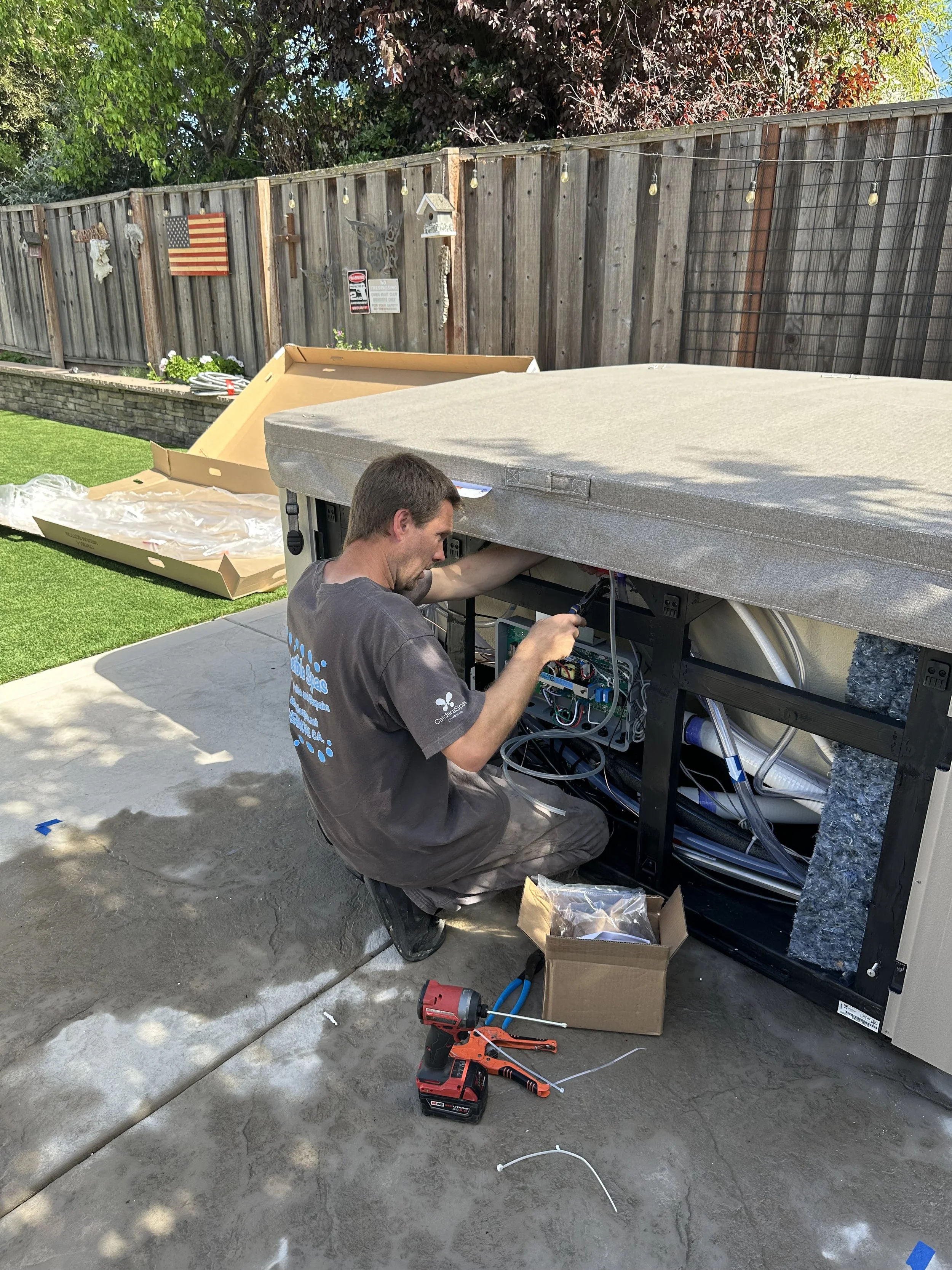 New Caldera Spa installation, Kenny is connecting an ozone system. This helps kill bacteria, so your chemical usage is less 
Tracy, CA