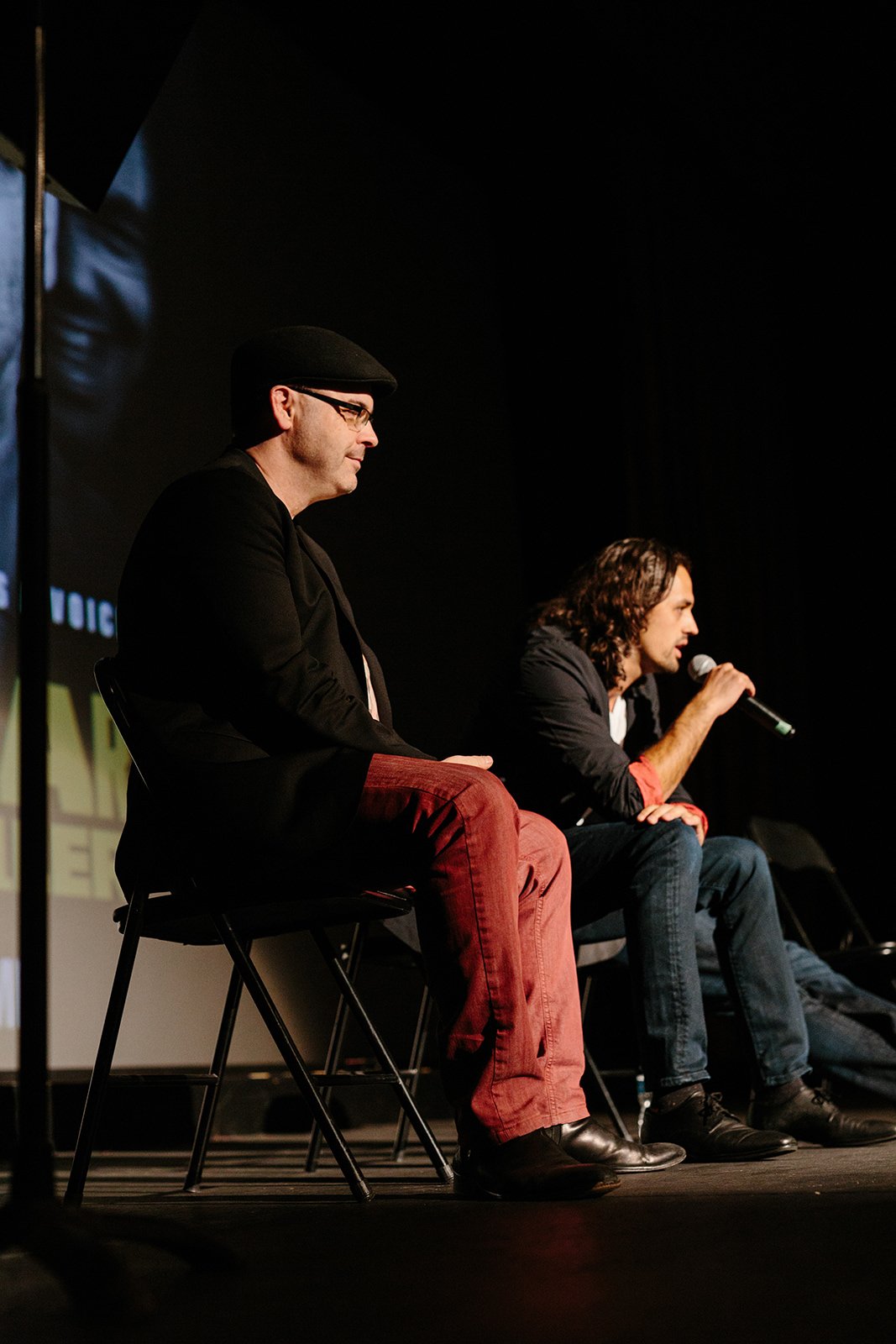Film Screening for Bipolar Rock N Roller. Calgary Event Photography by Kapia Creative. Film director speaking to the audience.
