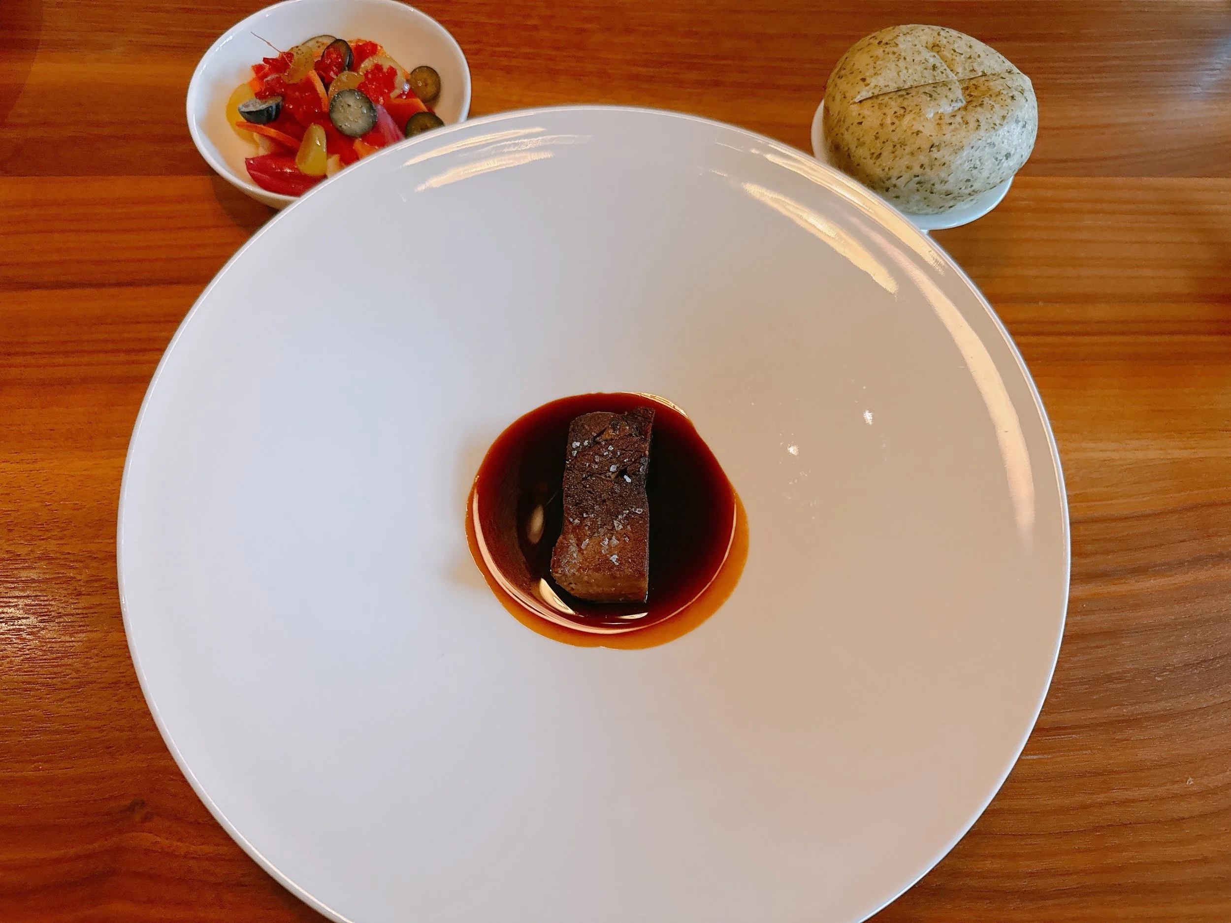 Wagyu tongue, pickled vegetables, steamed bun