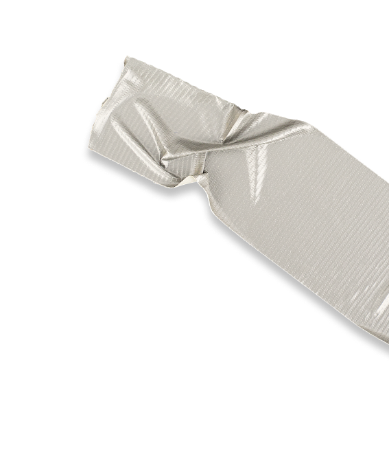 A partially unwrapped silver foil candy wrapper on a black background.
