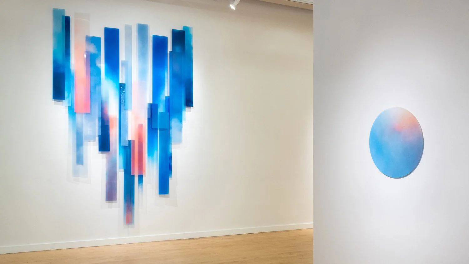 Installation shown hung on a wall across from "Force Field (Dawn)"