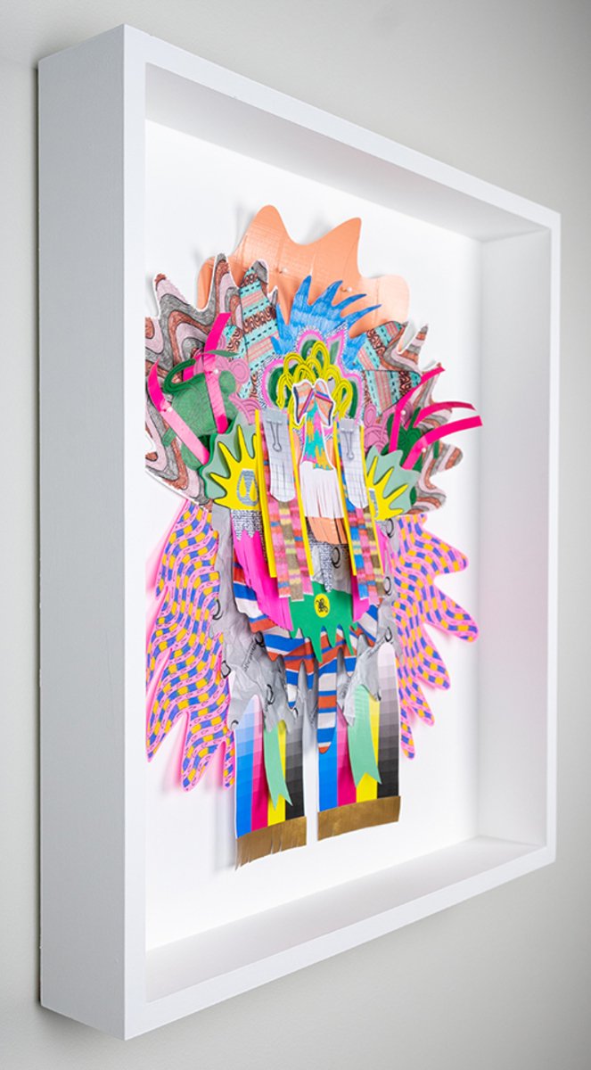 Side view of a colorful collage that uses paper, photocopies, colored pencil, marker, and duct tape