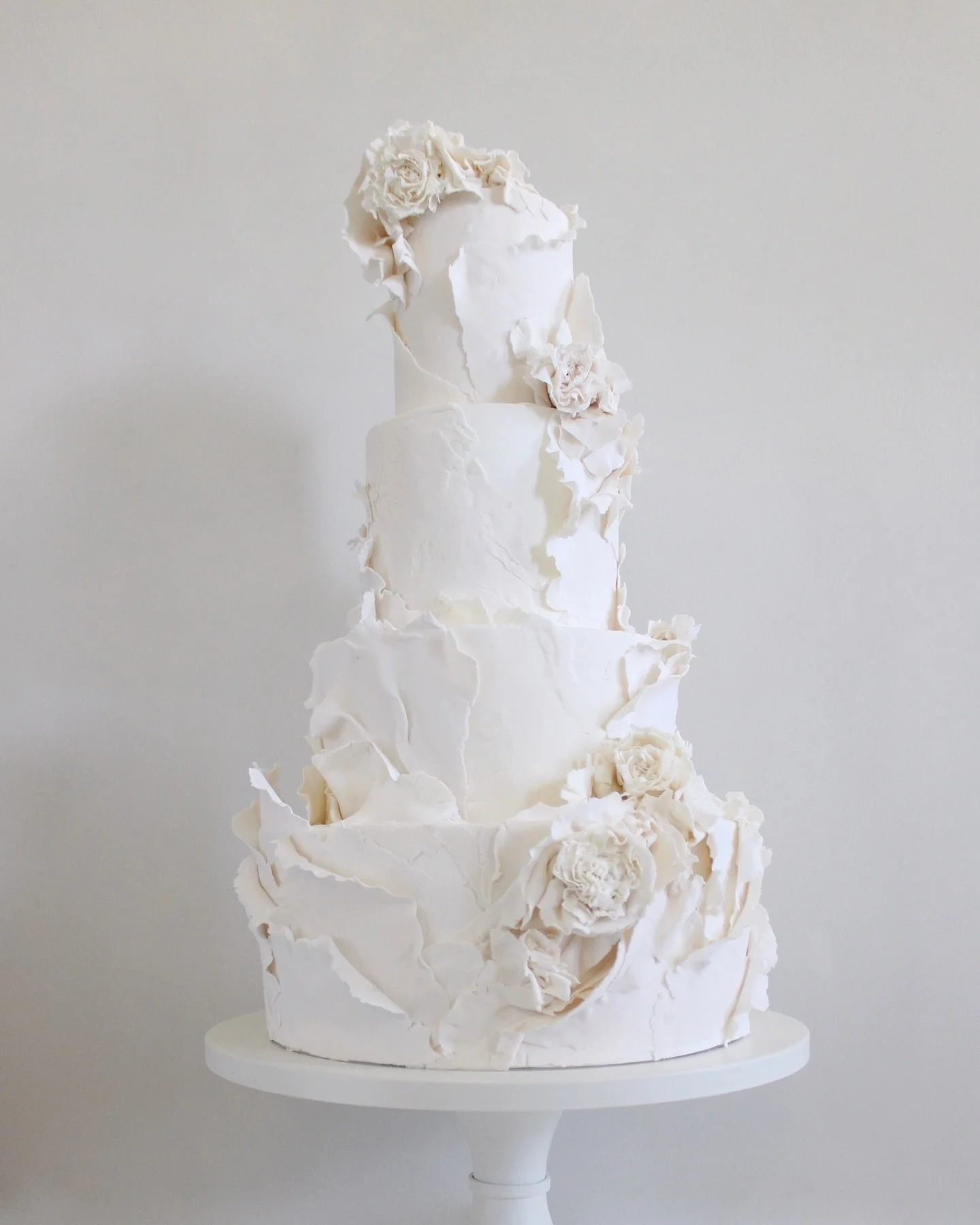 A cake designed to live amongst the statues. 

When a couple brings enthusiasm and generously gifts you the freedom to explore and play, amazing things occur. 

J+K imagined a cake that was, not only beautiful but built to enhance the space it would 