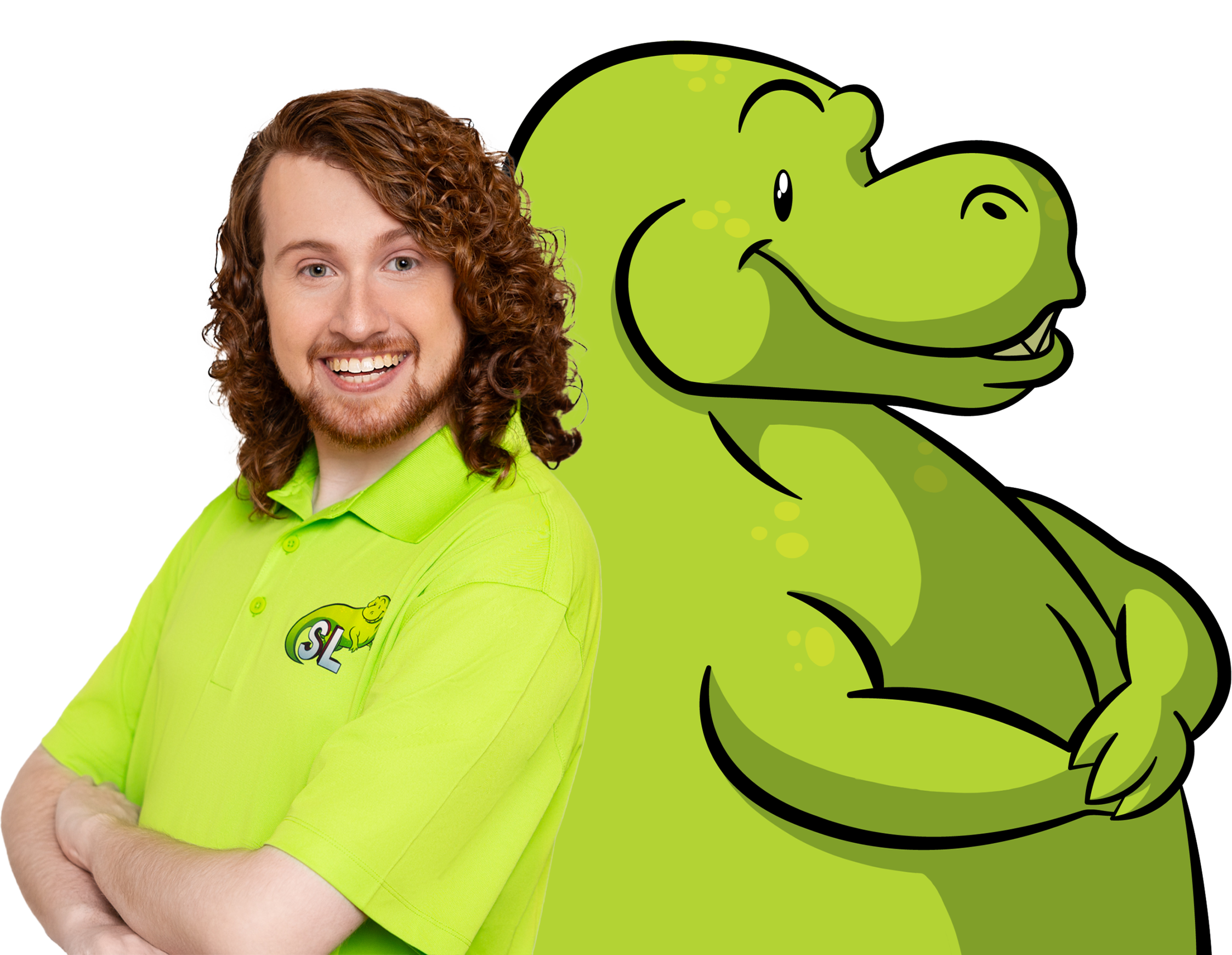 A person with red curly hair and a beard wearing a bright green shirt with a logo that includes a dinosaur and the letters 'SL' stands with arms crossed in front of a cartoon green dinosaur.