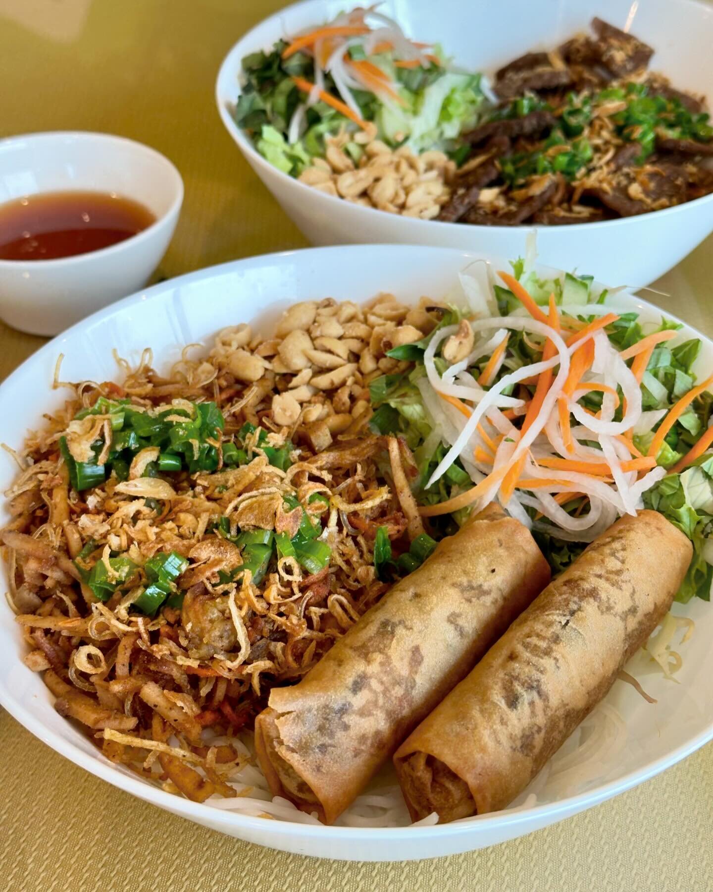 Choose between two amazing rice vermicelli bowls, perfect for a fresh and tasty lunch! Both bowls feature a base of rice noodles, topped with fresh lettuce, herbs, bean sprouts, pickled daikon &amp; carrots, and garnished with fried onions and peanut