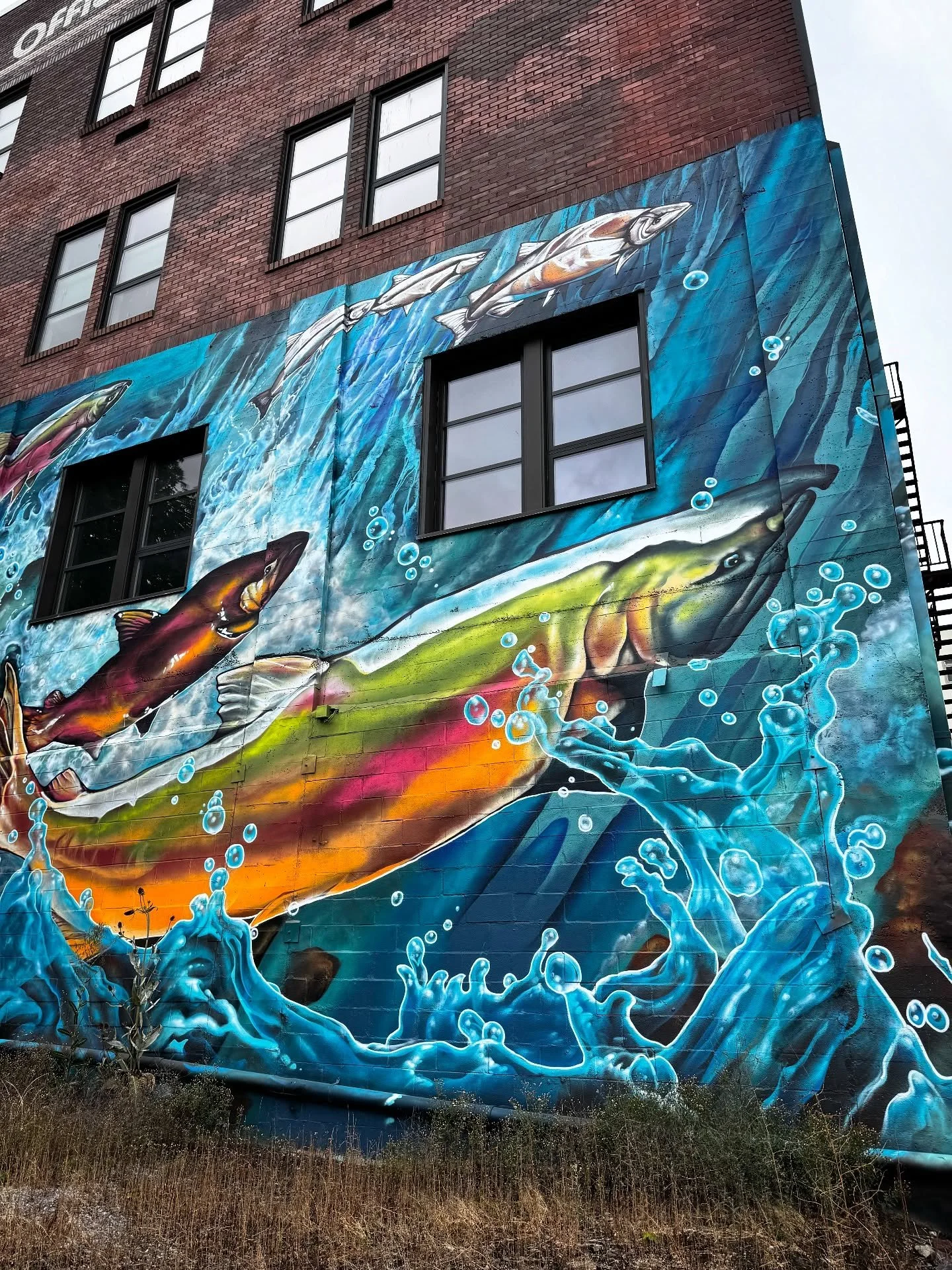 Last summer this piece leveled me up in a few ways: it's often viewed at a greater distance than any piece I've done before so the technique and approach had to change to render things realistically that could be read well from hundreds of feet away 