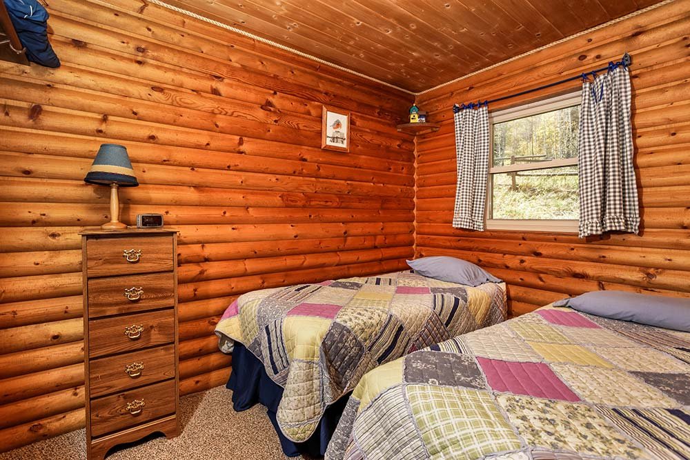 Cozy bedroom with two twin beds