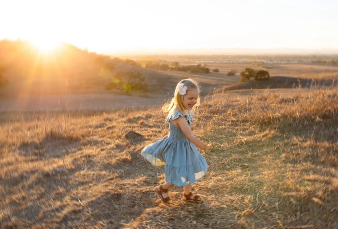 Between coordinating outfits, juggling schedules, and dodging illnesses, getting the family out to take family pictures can be a herculean effort. As a mom to a 2 and 5-year-old, I totally get it. But what I love is that once we get there and are abl