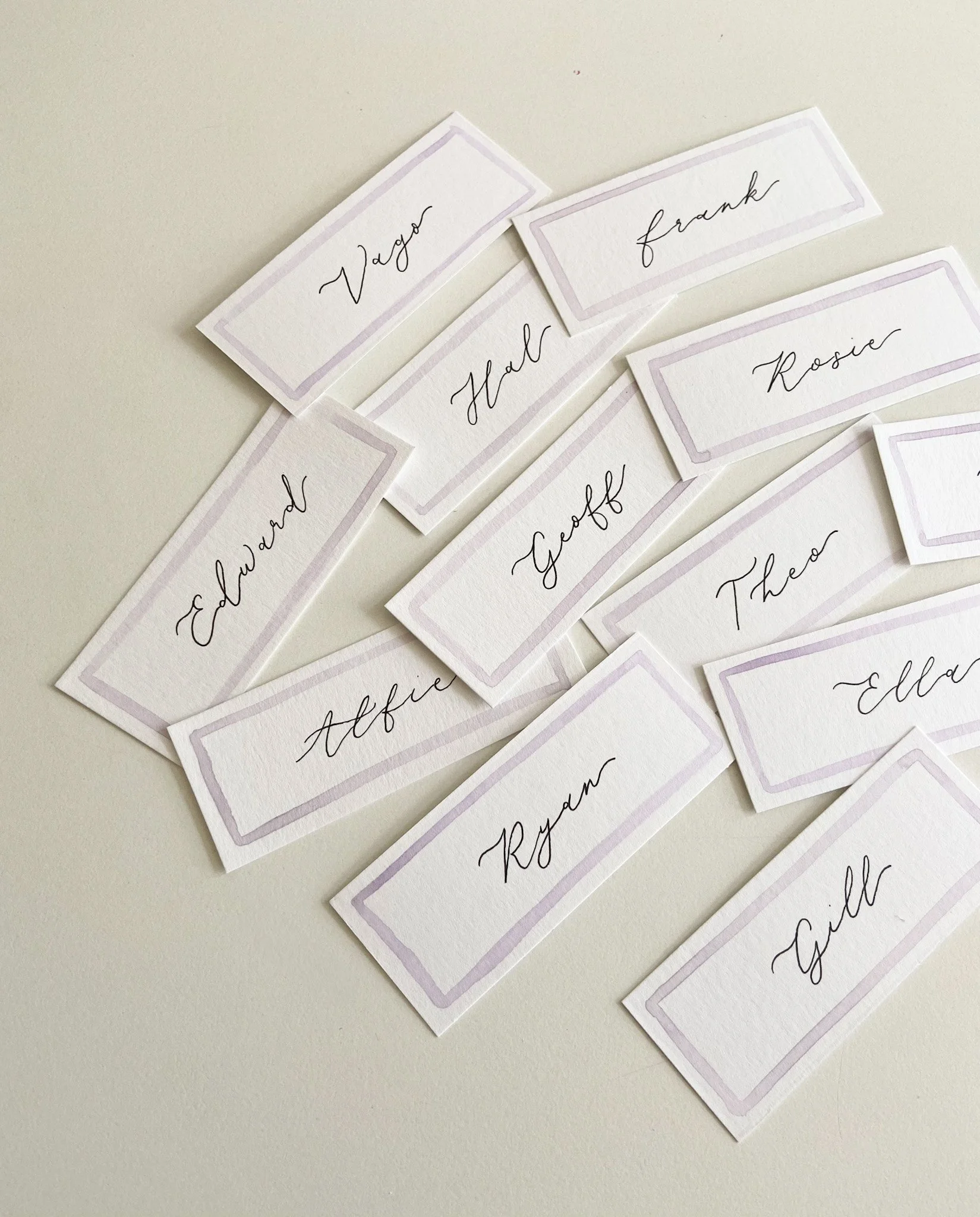 hand-painted-watercolour-border-script-calligraphy-place-card-place-name-wedding.jpg