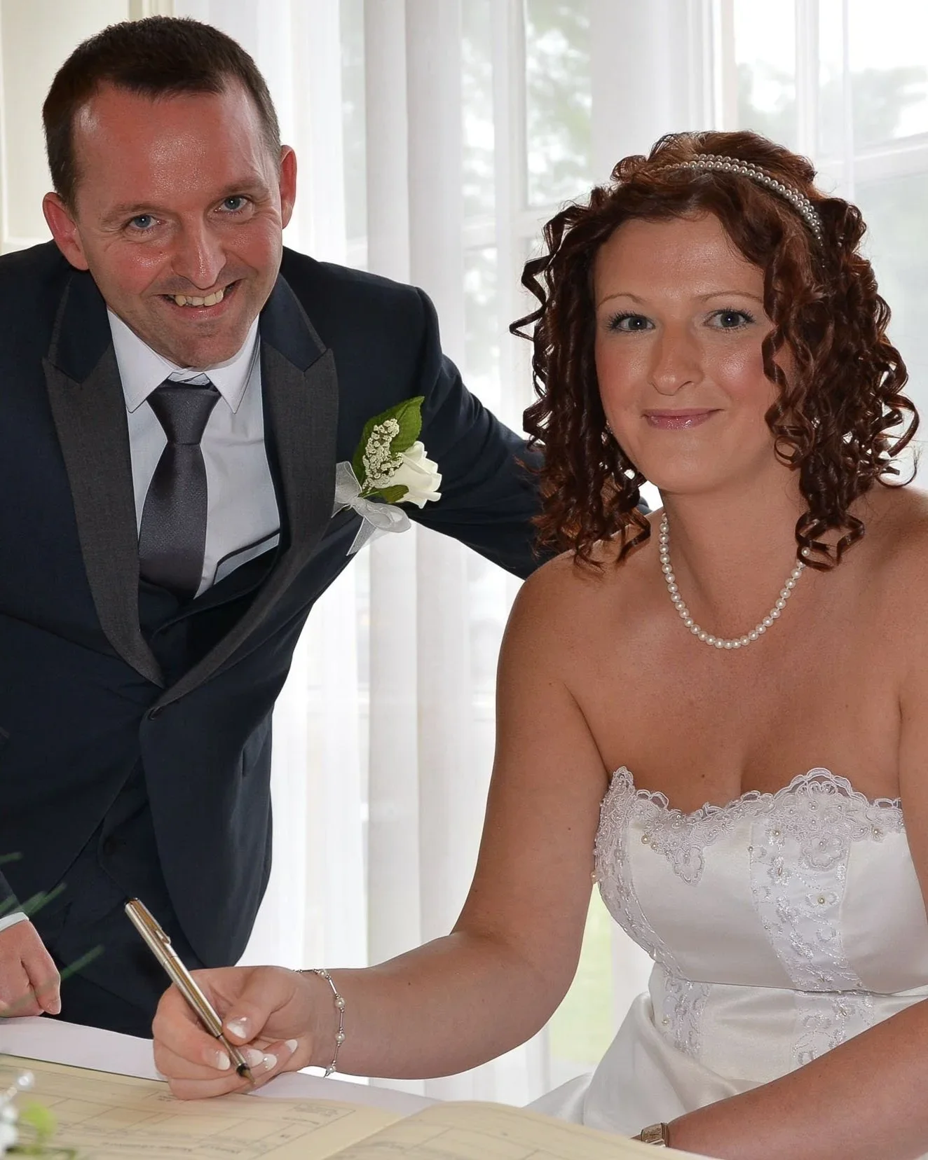 It's official. Married couple A & C signing the register at Blackburn Dunkenhalgh Hotel