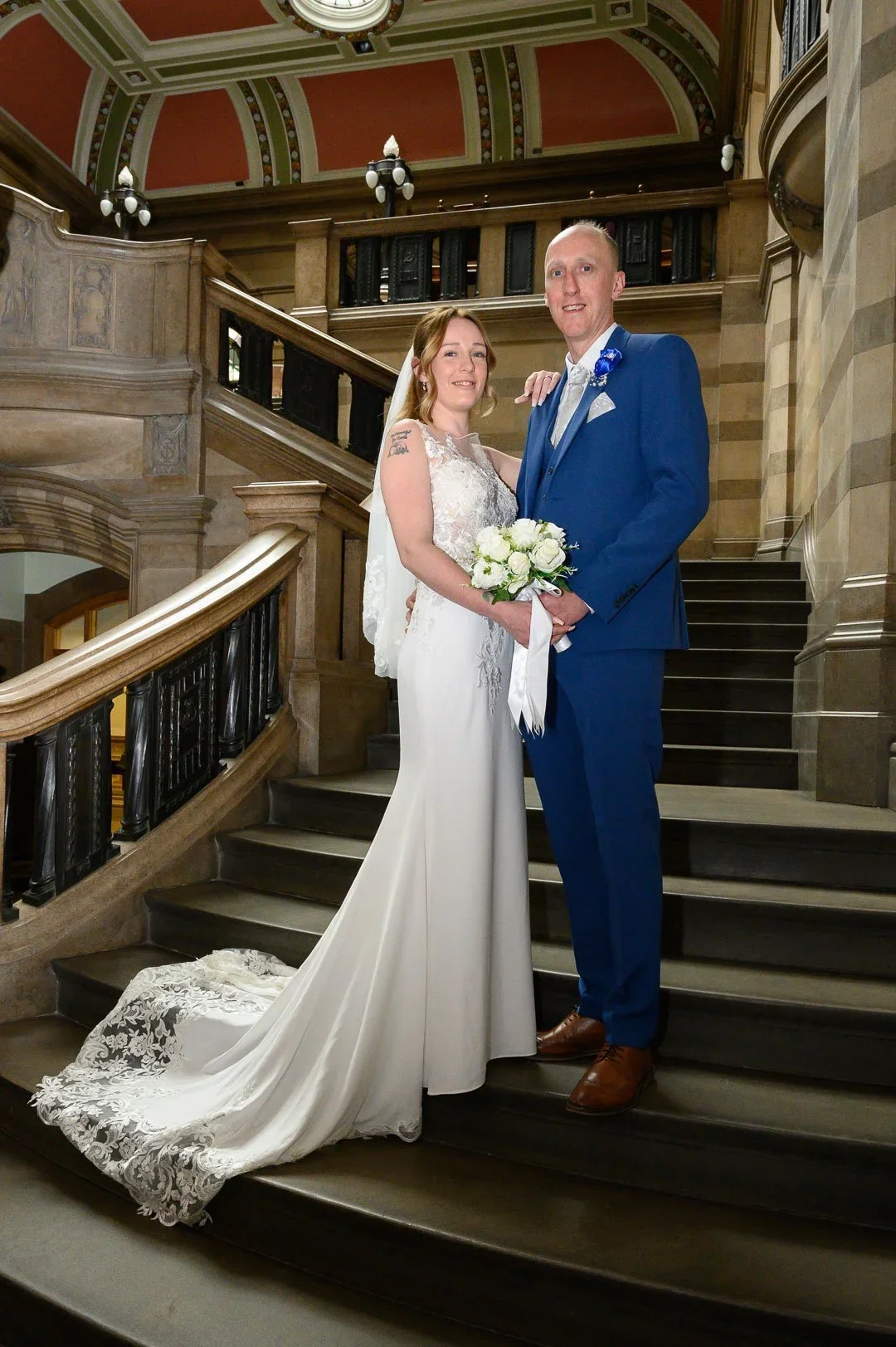 Bride and groom portrait on the stunning staircase at City Hall, Bradford.