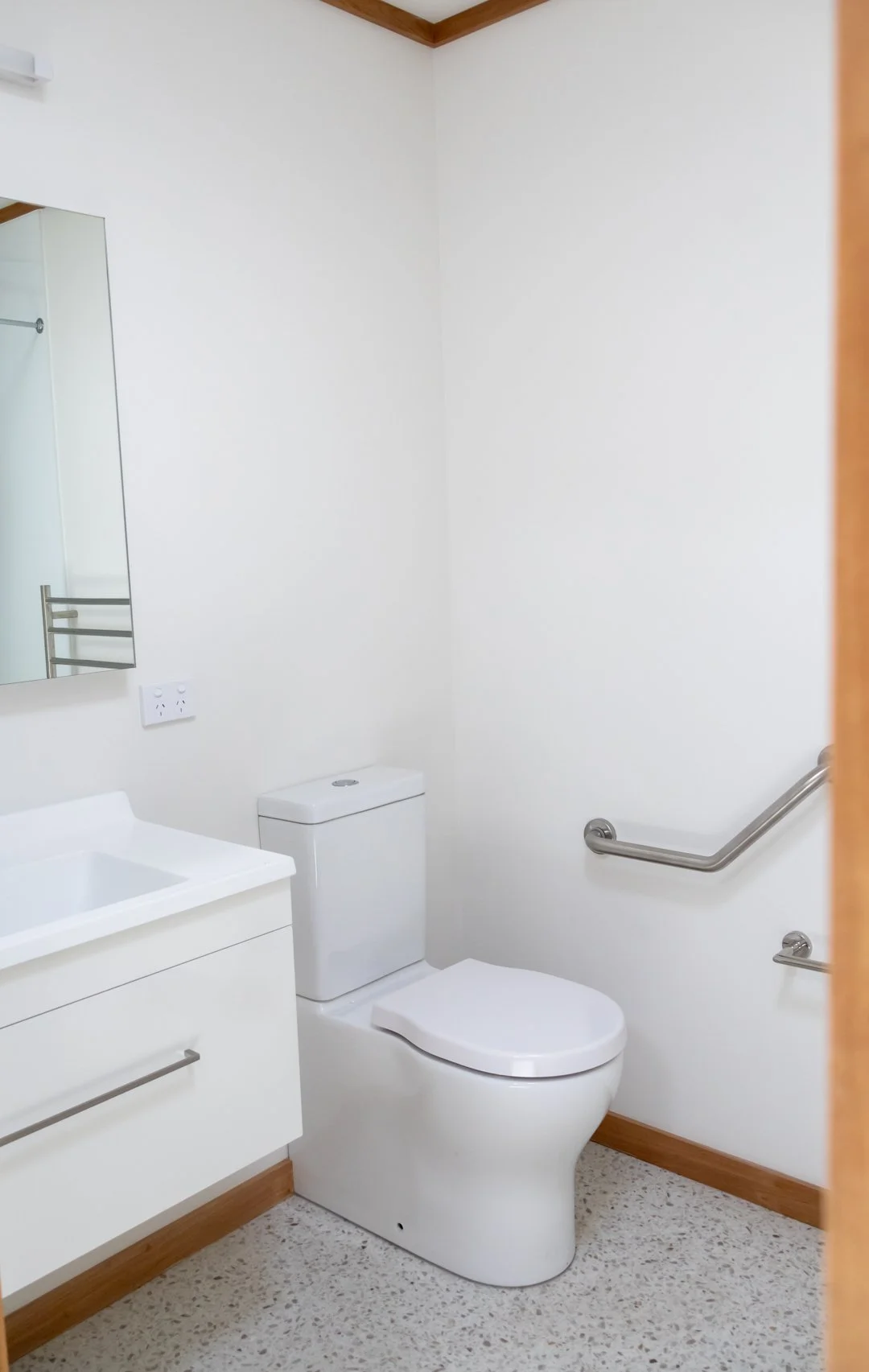 Bathroom area with accessibility features