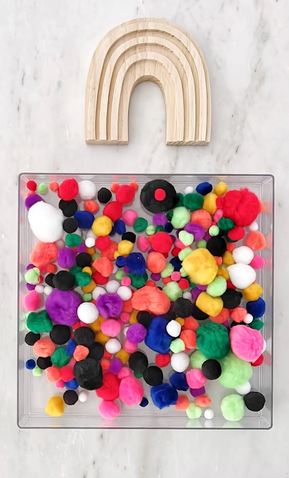 Easy PomPom Rainbow Sensory Bin Fine Motor Work for Kids
