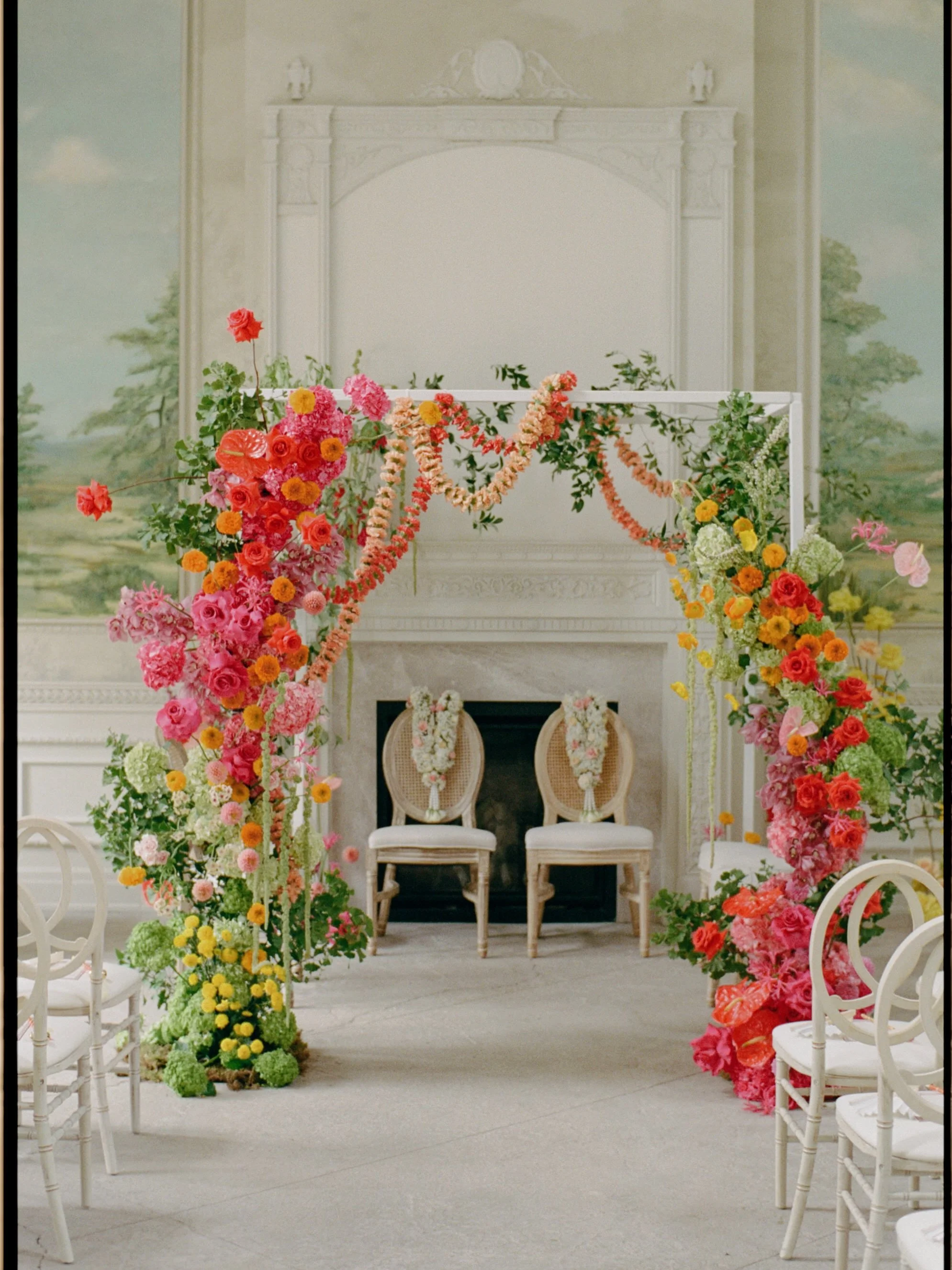the dreamiest mandap, overflowing with fresh florals, bold hues, and layers of texture. when your culture is rich in colour, lean alllll the way in. instead of toning it down, we embraced it - layering vibrant blooms and playful details to create som