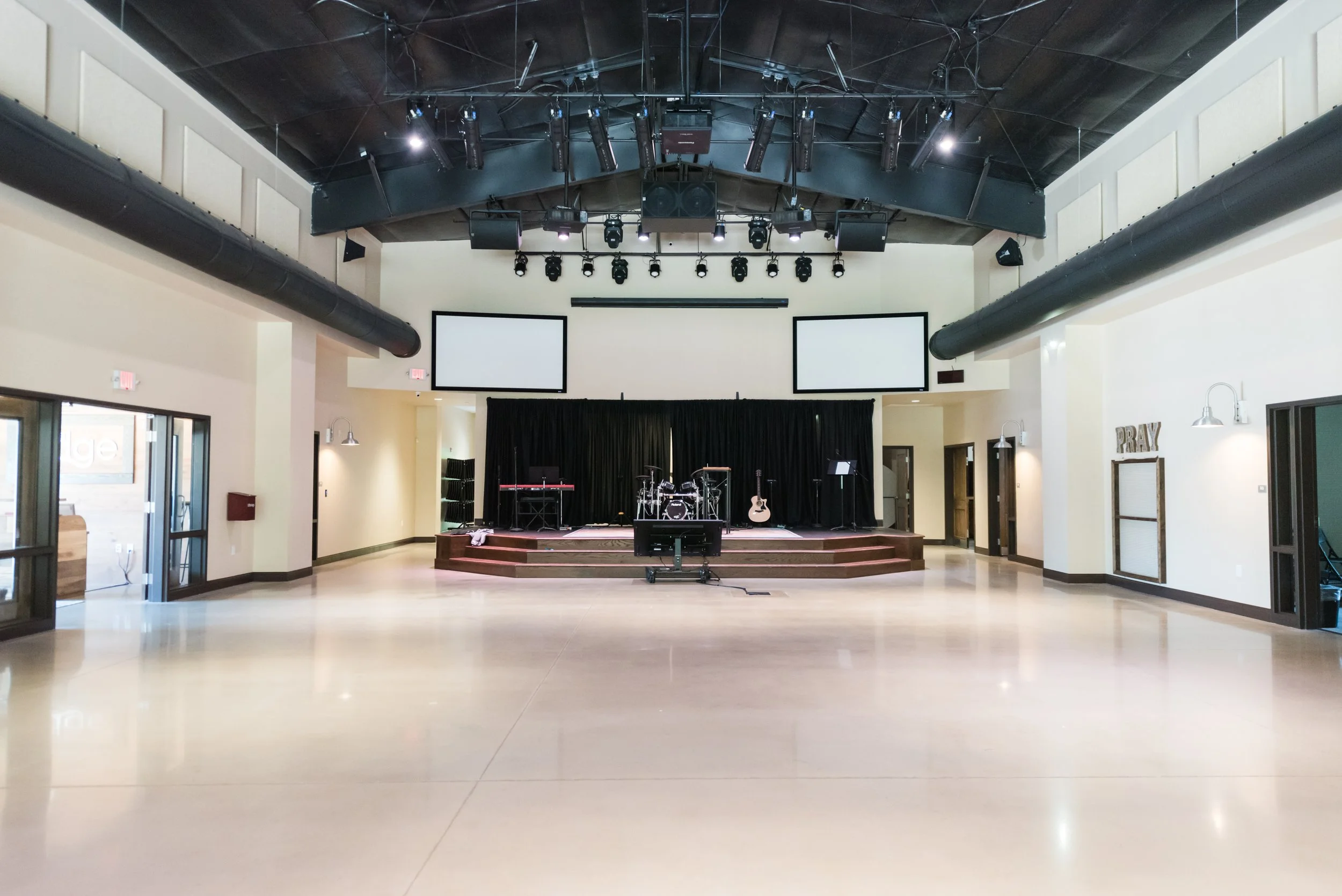 Interior Worship Area with Stage and Lighting