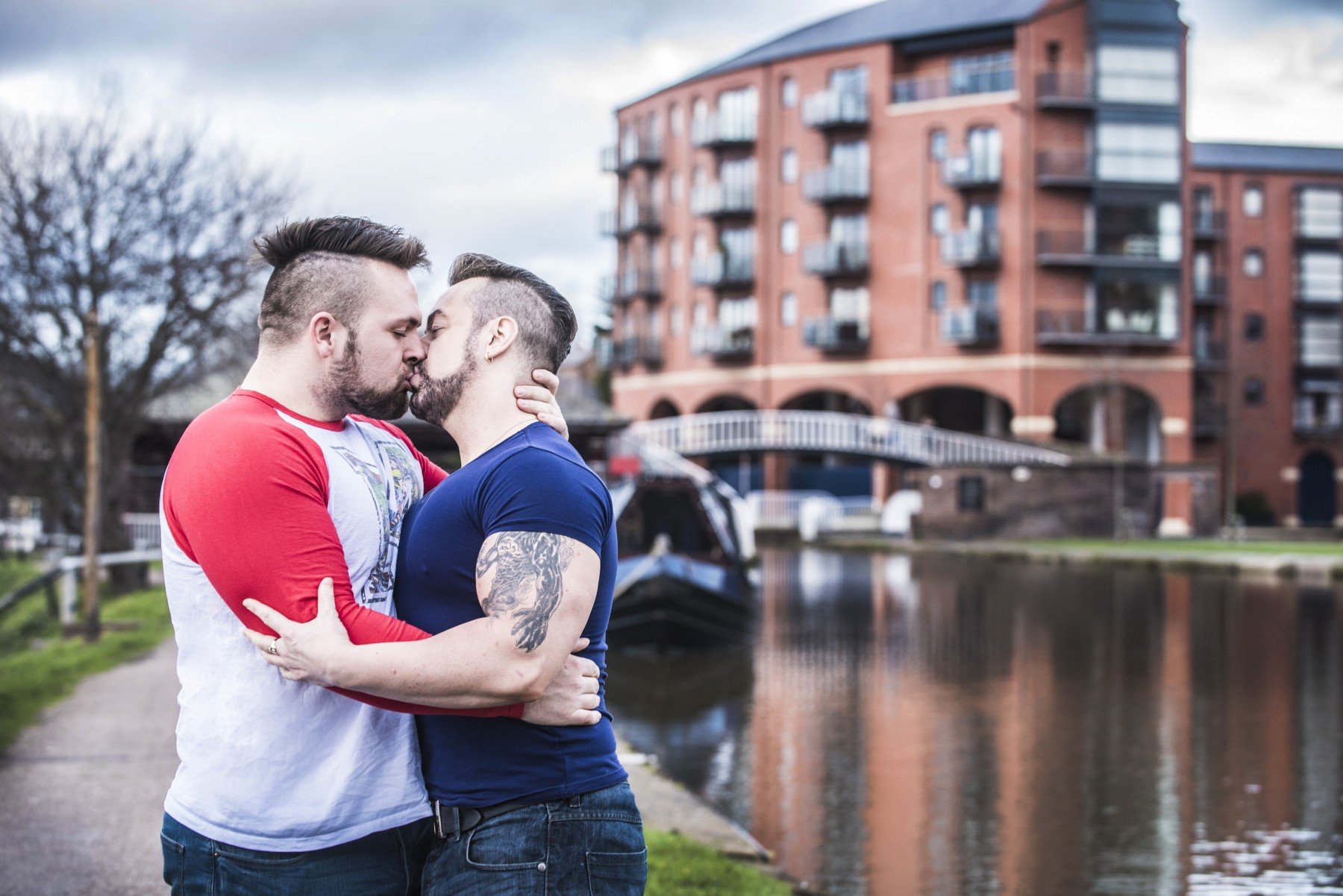 Two men kissing by Chester canal
