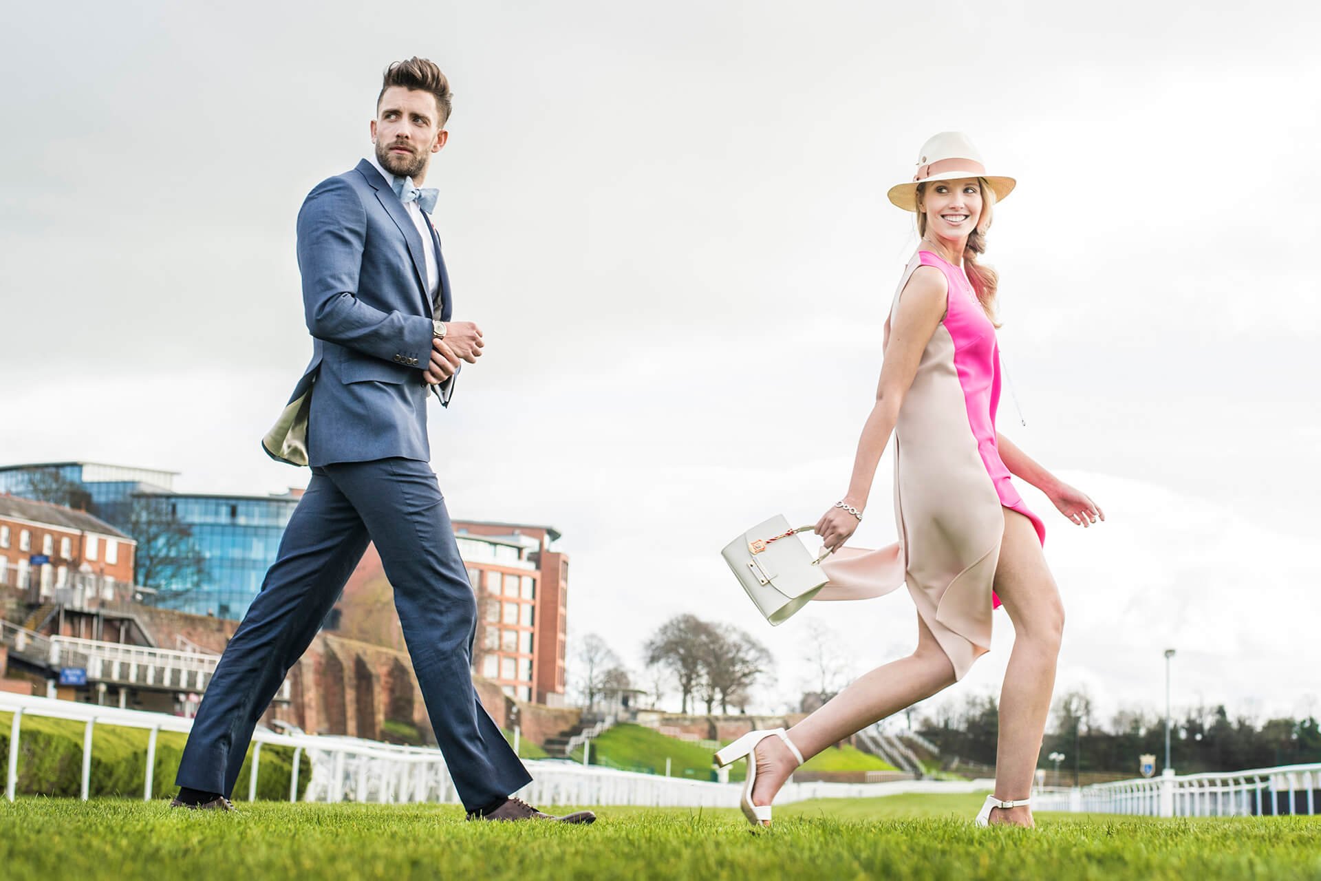 Man and woman walking on Chester races