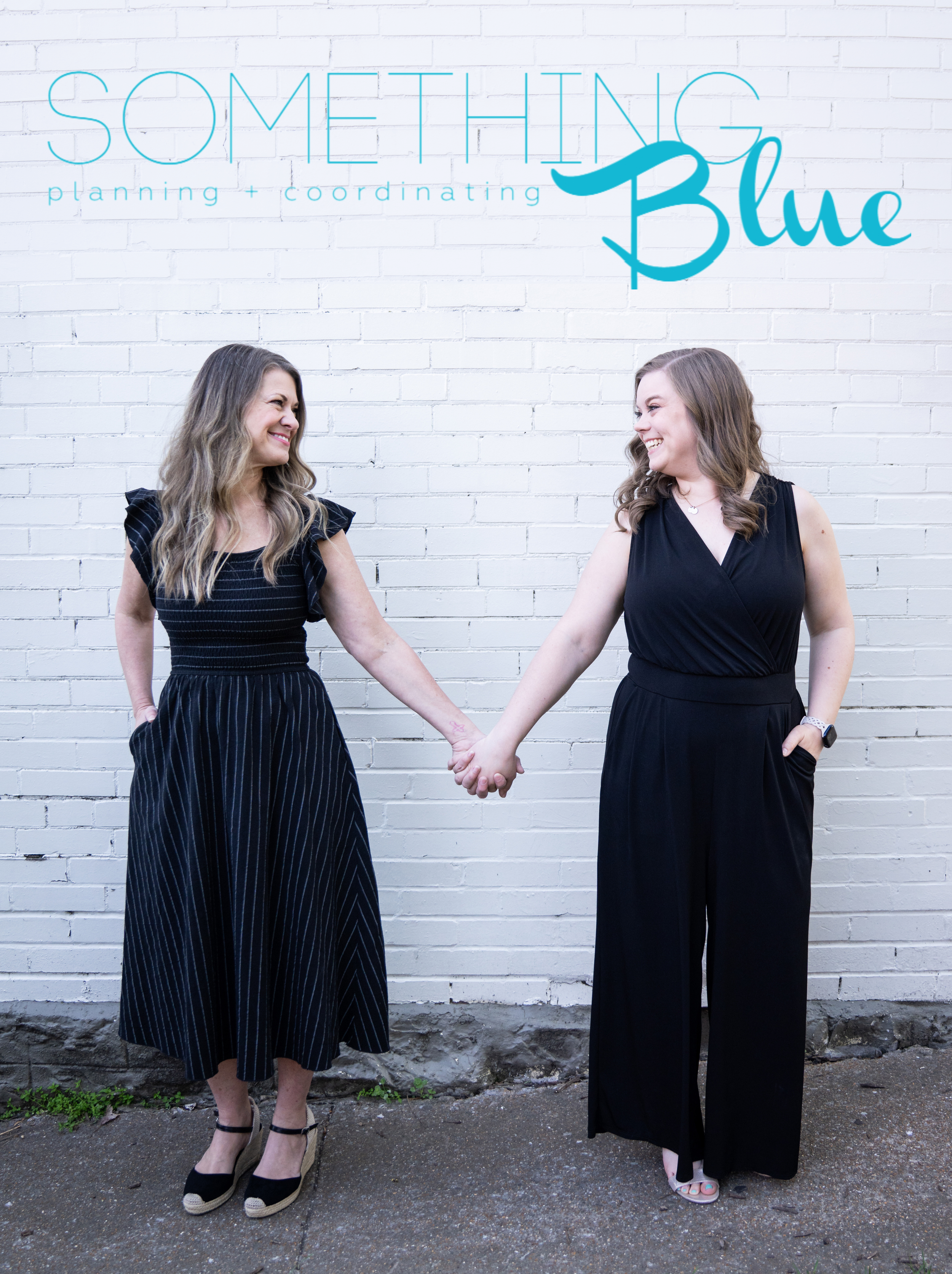 Photo of owners Desiree and Meagan, a mother daughter team, holding hands and smiling at each other with a logo above for Something Blue Planning + Coordinating