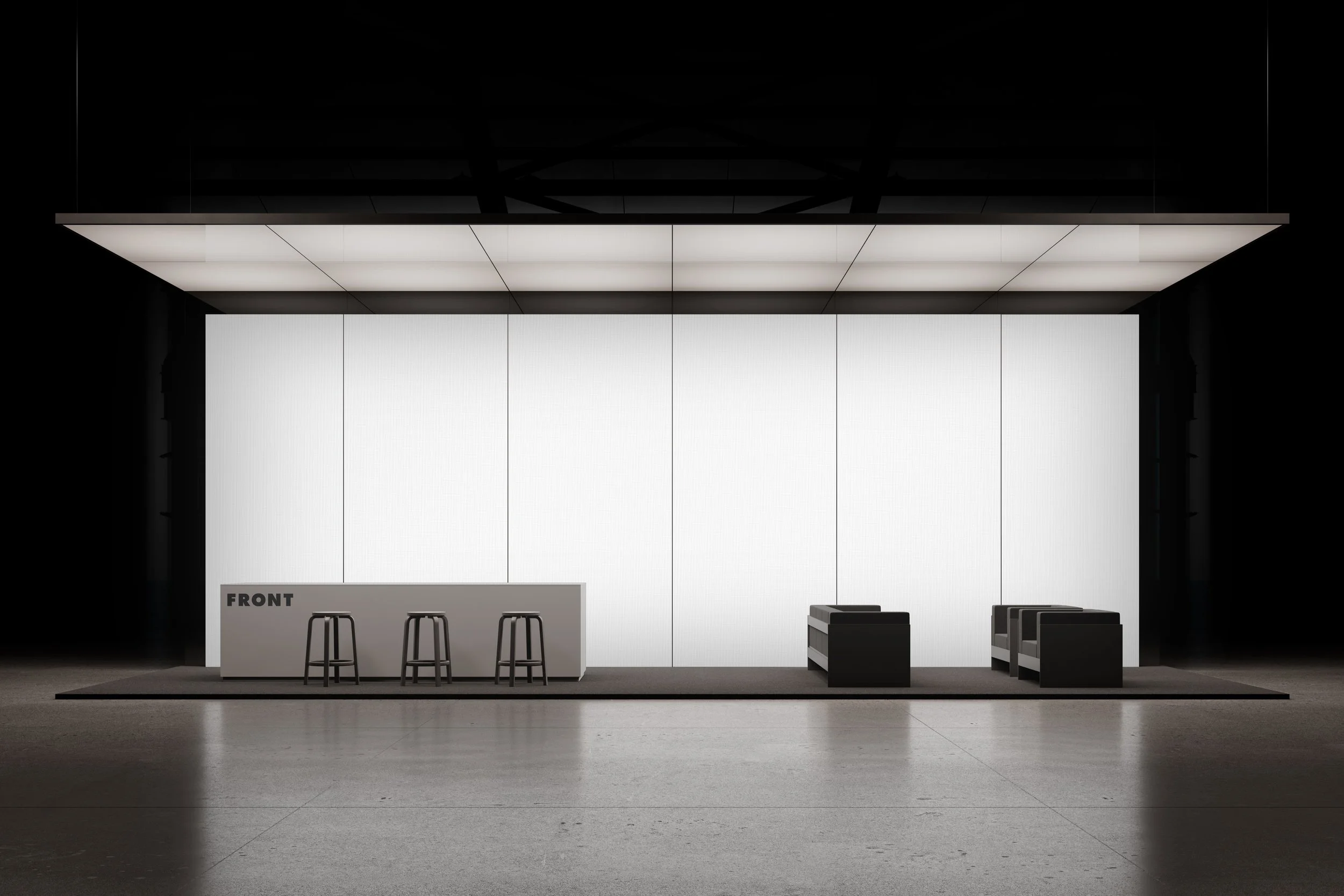 Exhibition booth mockup with neutral lighting in an industrial event space.
