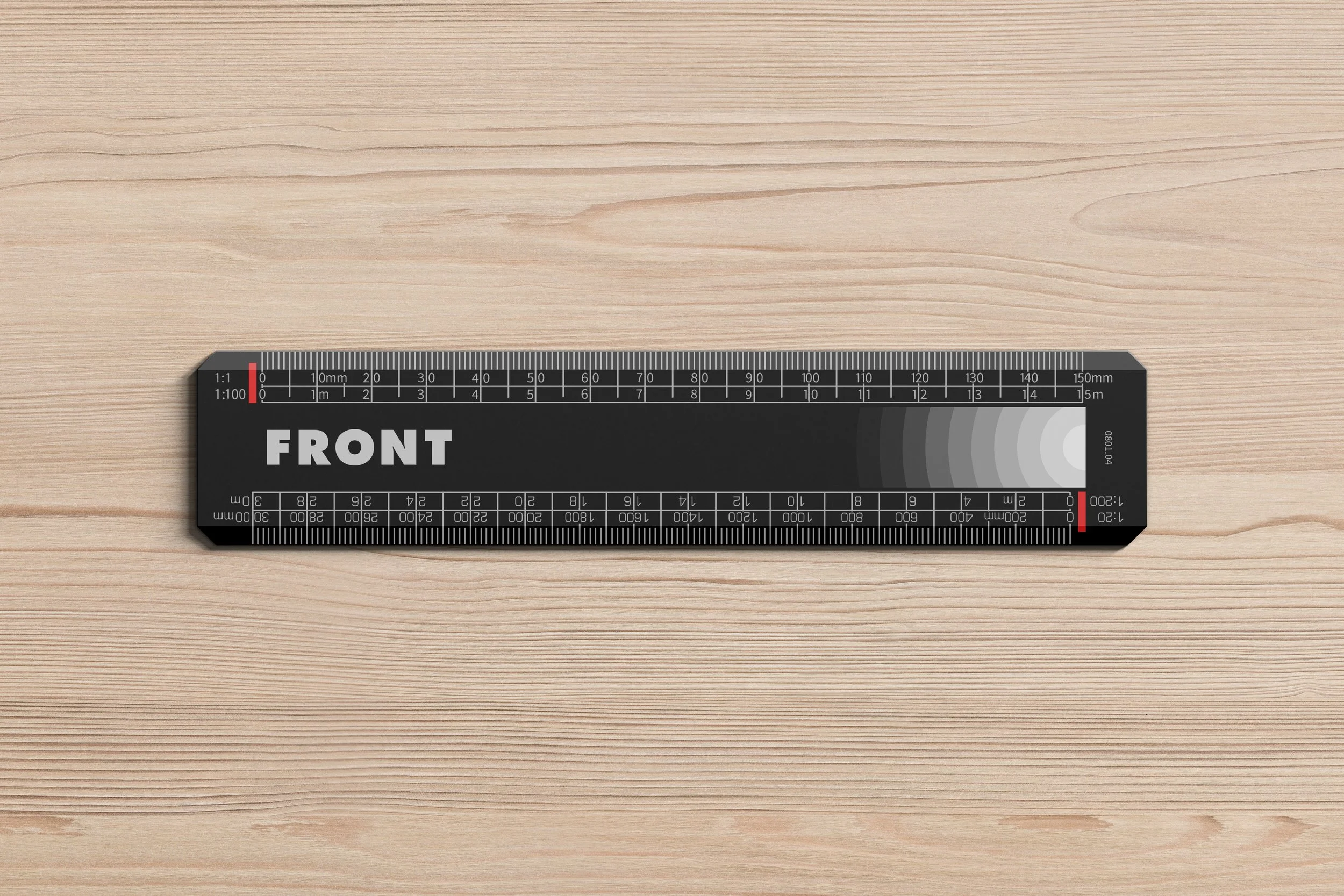 FRONT modular ruler mockup on light wood background, black version with precision scale and branding