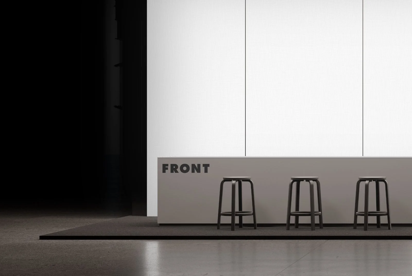 Close-up exhibition reception desk mockup with white branding wall and editable front logo area.