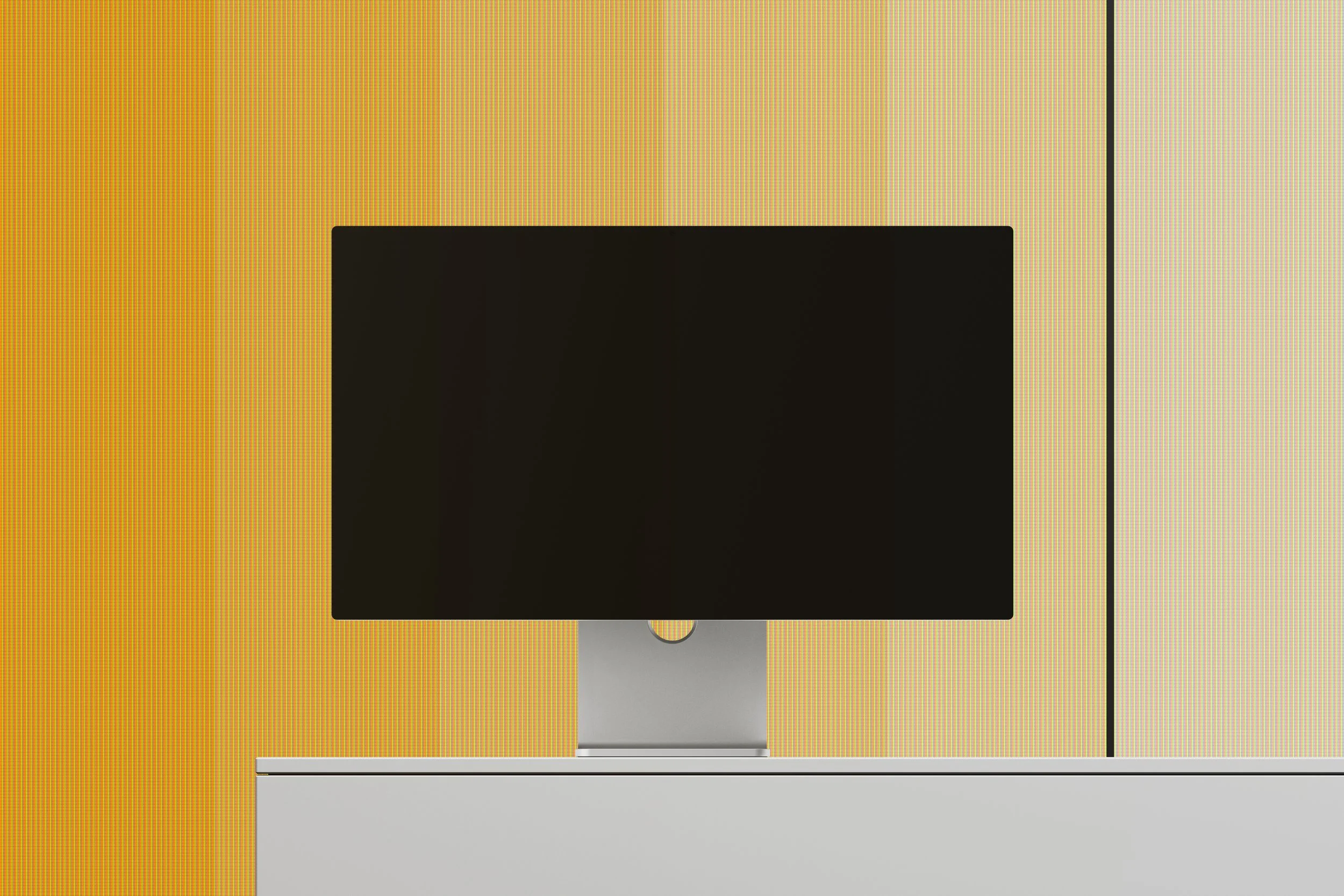 Apple Studio Display on exhibition podium with display turned off