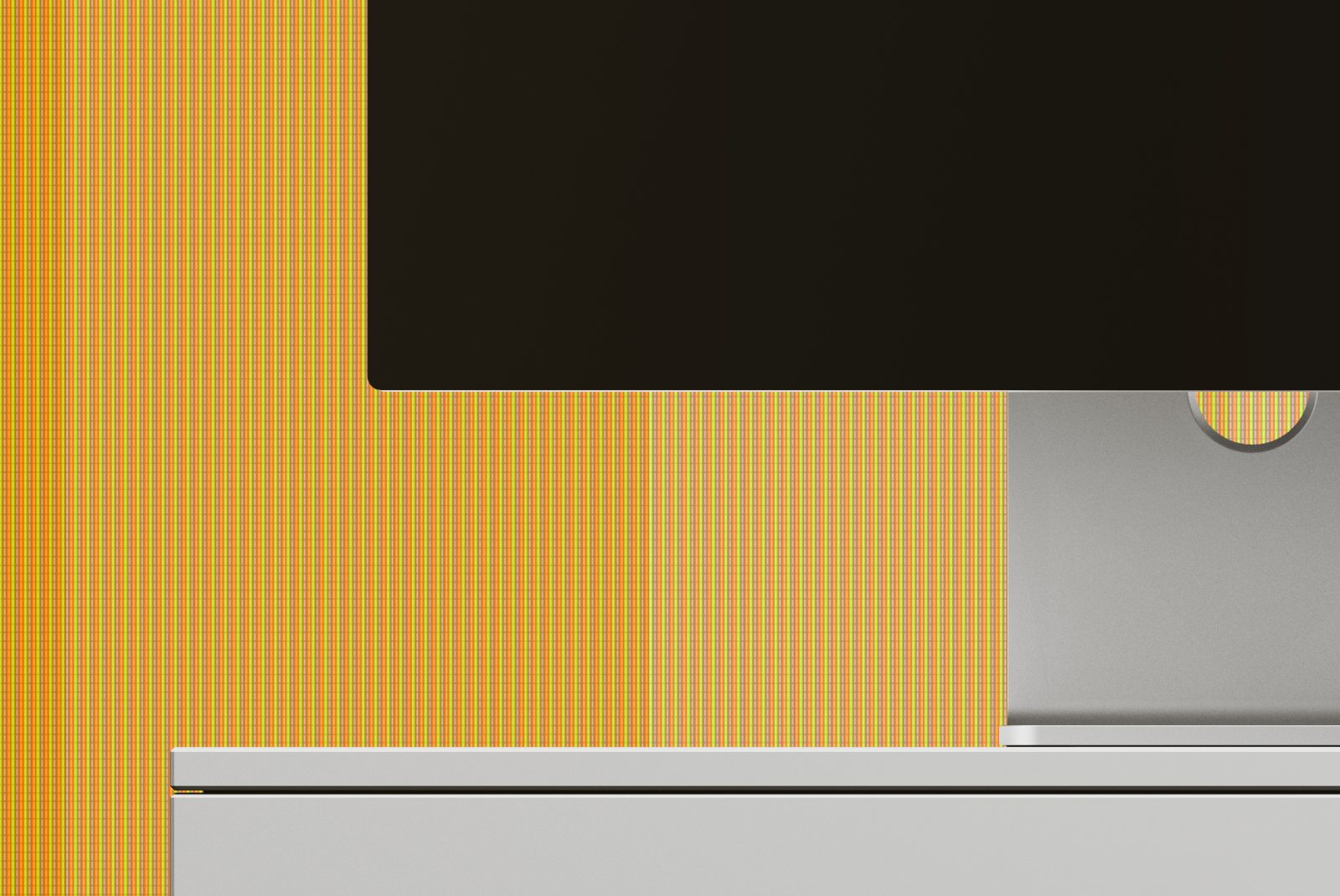 Close-up of Apple Studio Display on exhibition podium with display turned off