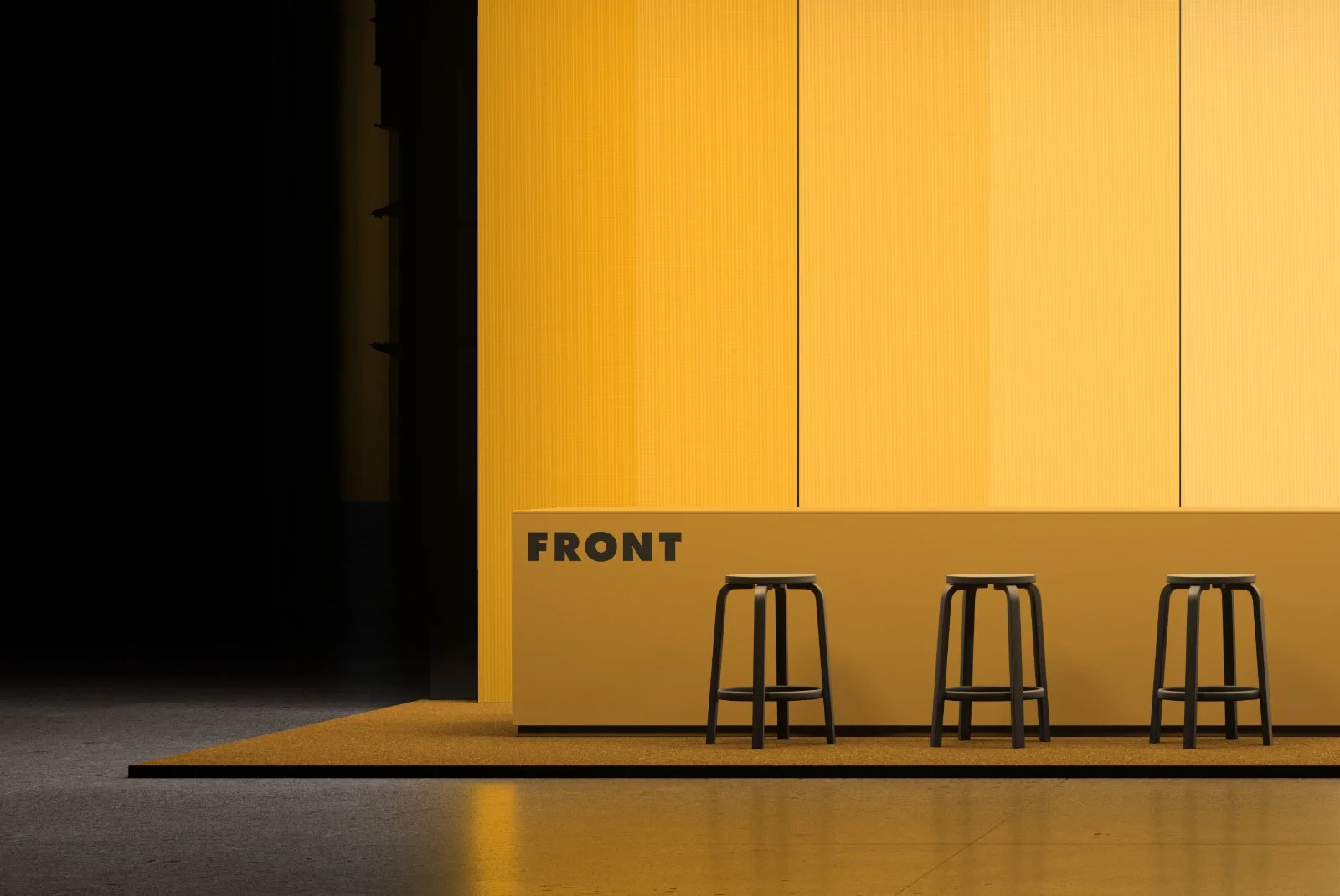Close-up of exhibition booth reception counter with customizable logo area and illuminated branding wall.