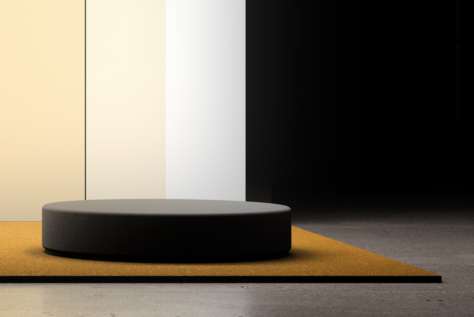 Round upholstered bench on an exhibition platform with warm yellow backdrop