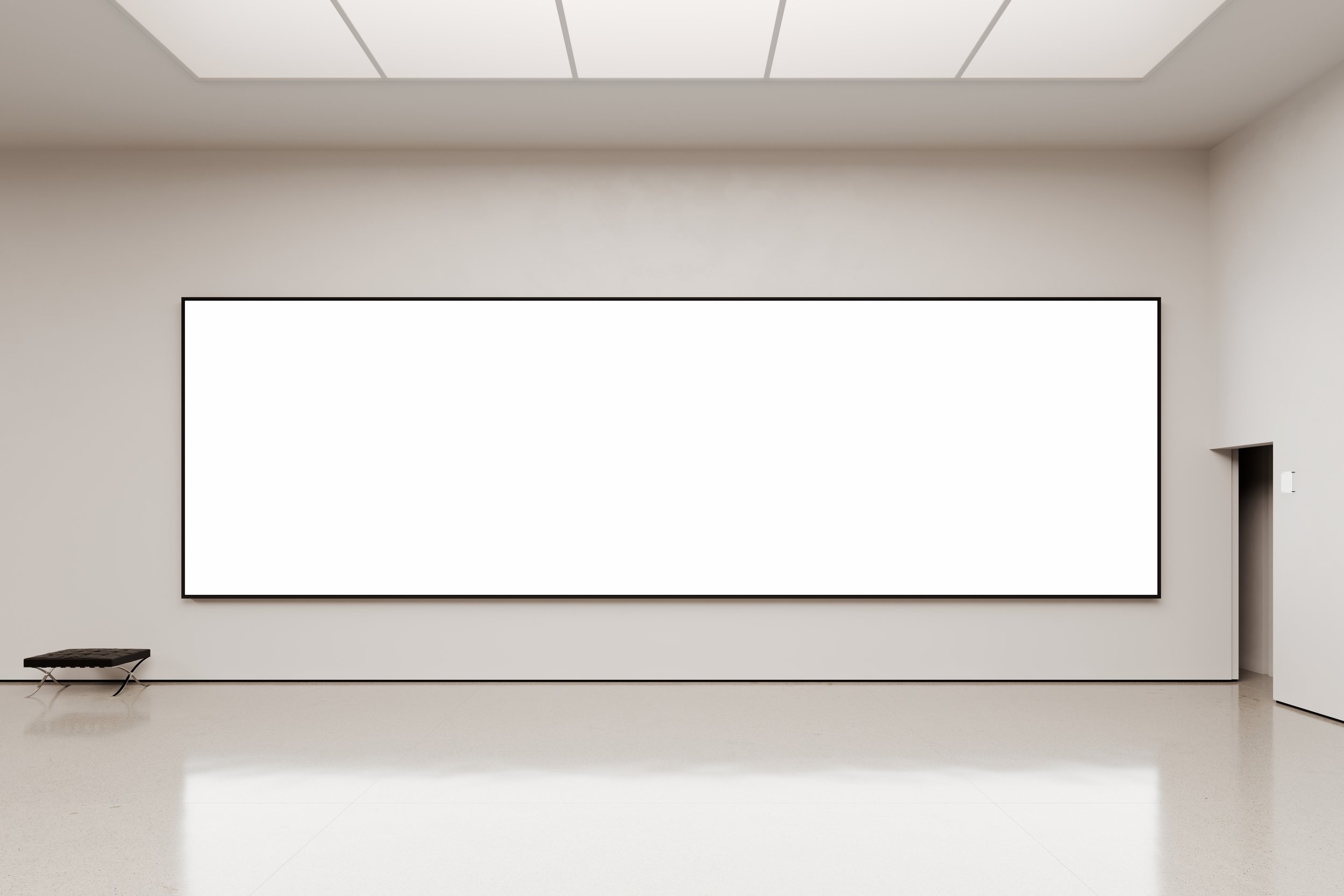 Large screen mockup on white gallery wall with blank content – FRONT Mockups
