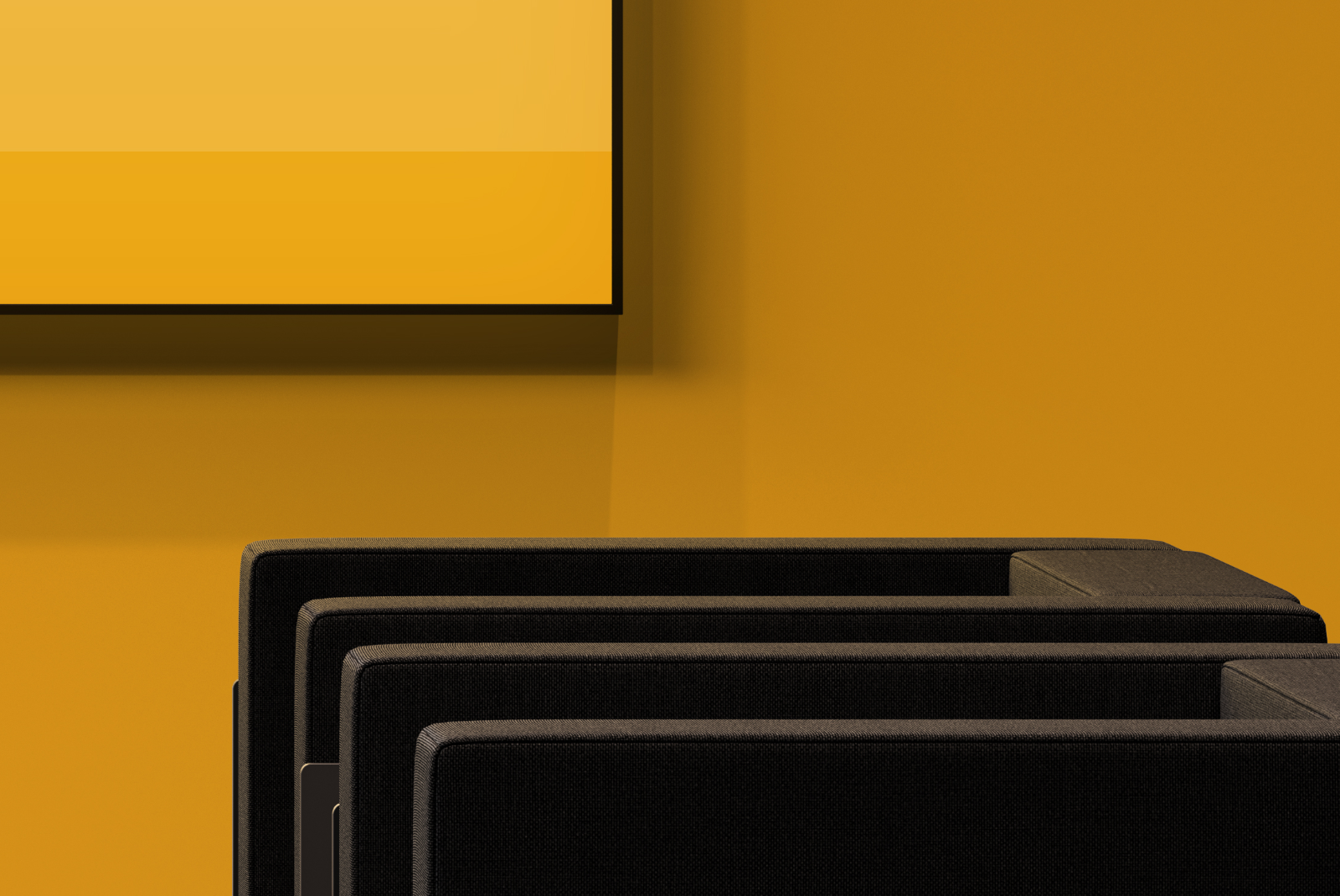 Detail of seating area in TV lounge exhibition booth with painted yellow wall