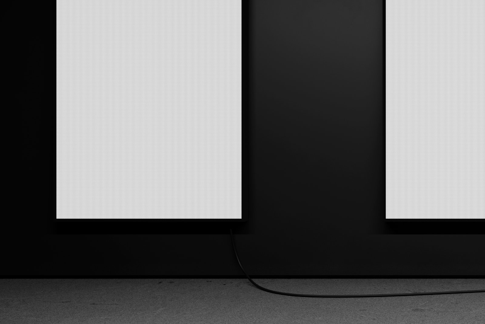 Close-up of left side of triple screens with blank white visuals – FRONT Mockups