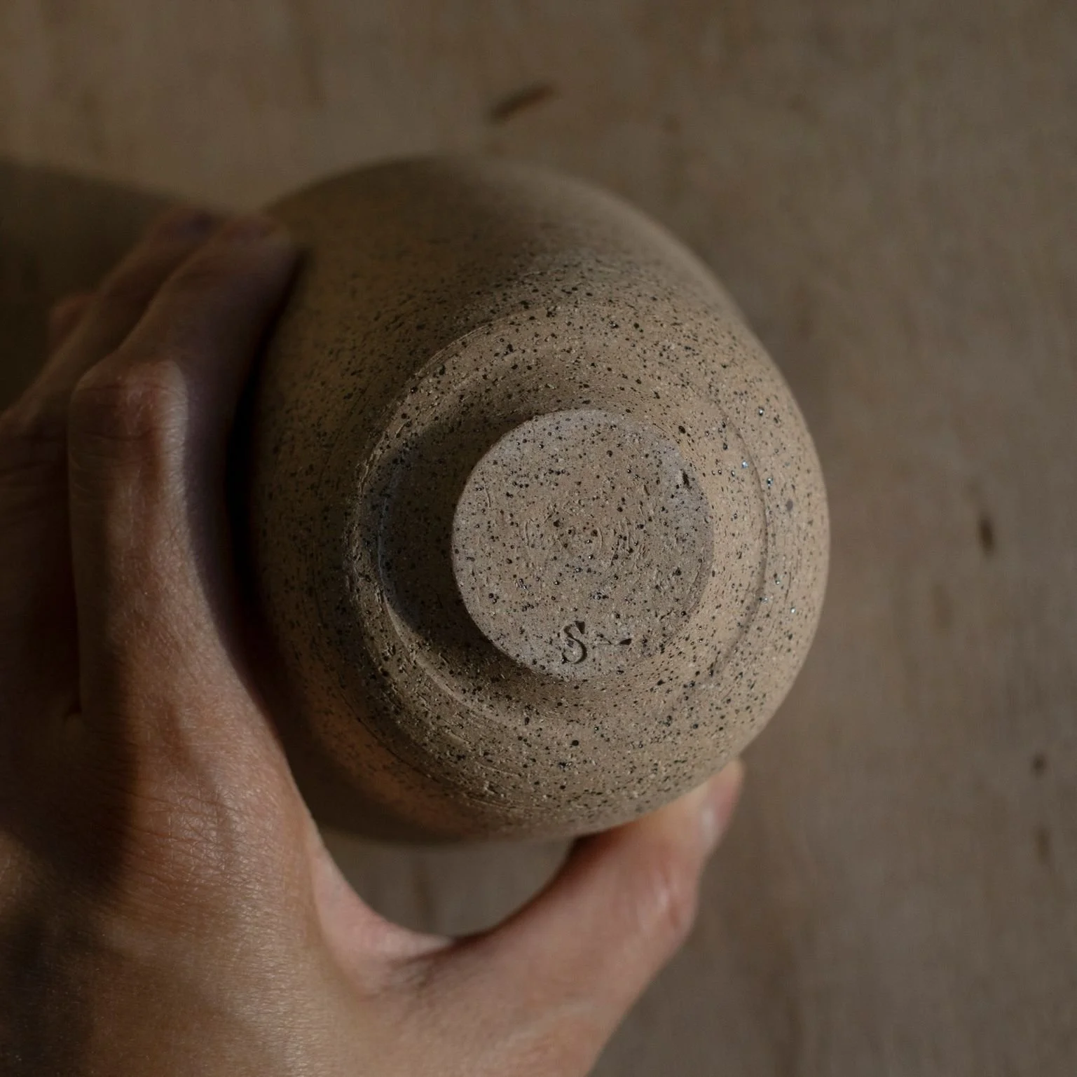 A maker's mark. 

Short story: A friend of mine thought this stamp was brilliant. And I had to remind her, she suggested that idea.