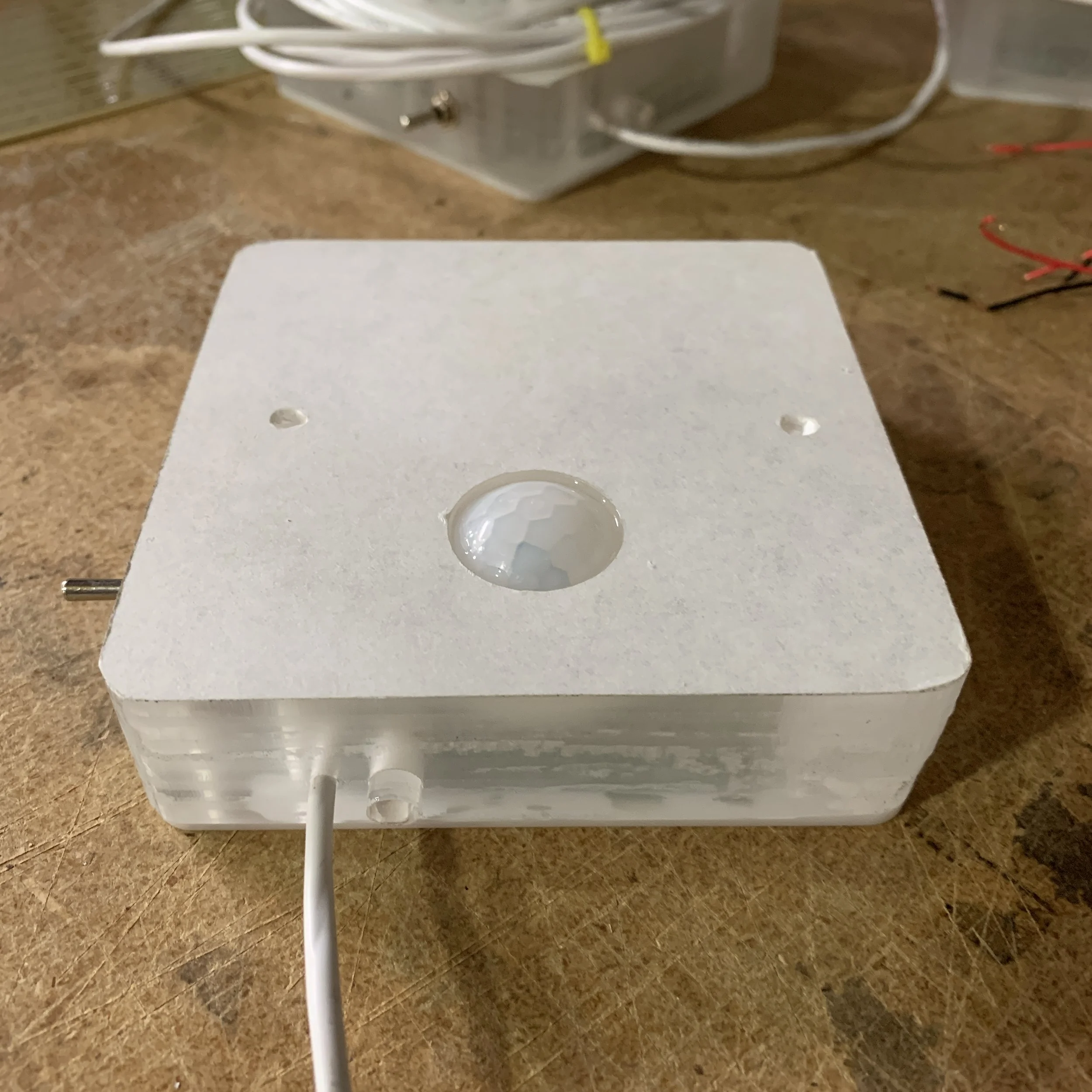 Motion activated with integrated photocell built into a custom LED brick