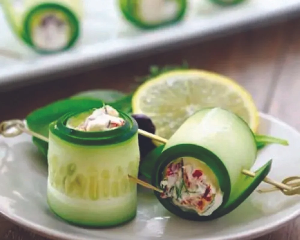 cucumber rolls stuffed with veggie salad
